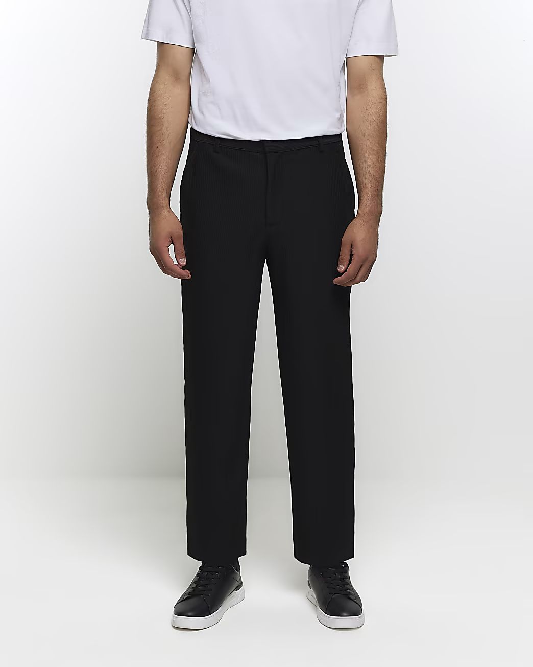 Black tapered fit plisse smart trousers | River Island (UK & IE)