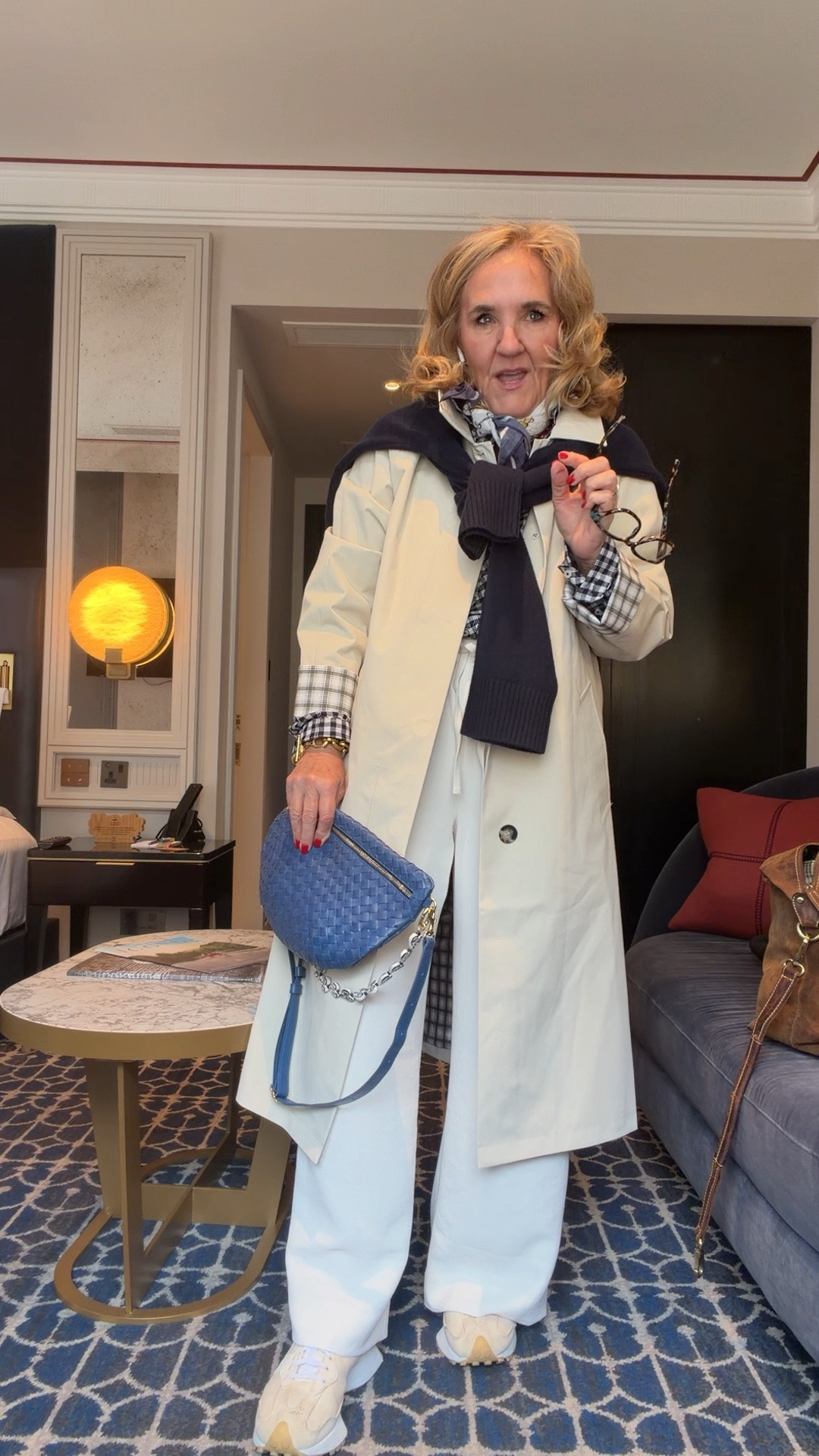 Out to the Tower of London. Perfect temp for layers. 
Trenchcoat medium petite
No wrinkle pants size medium regular and I had them hemmed
Ginghsm blouse size medium
I’m loving my purse. It’s a splurge, but I love the bright blue the strap and the flexibility to have it as a Crossbody or a fanny pack.
