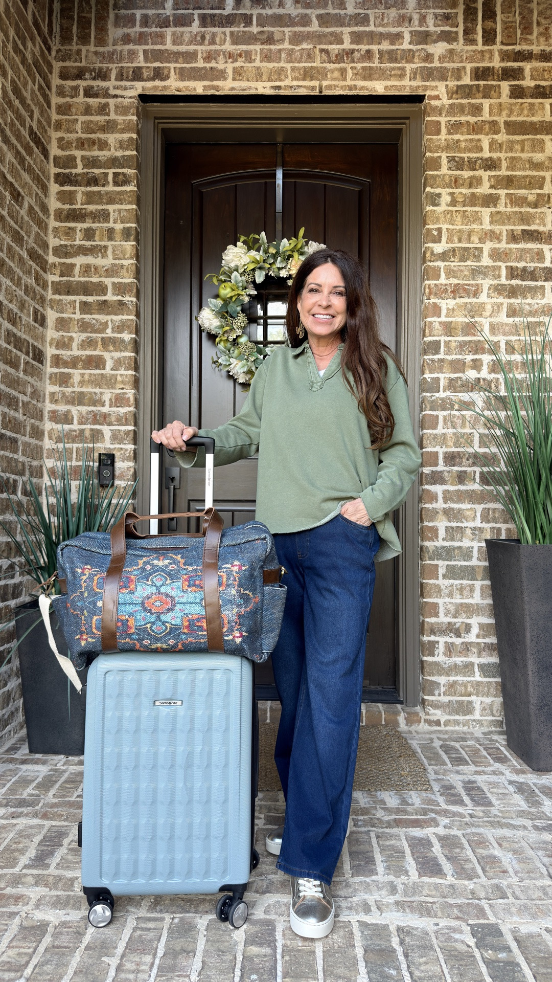 A travel day outfit option that’s comfortable and cute. Pull-on wide leg soft denim jeans with a ribbed tank and a cozy fleece pullover. I paired with gold drop earrings and gold sneakers. My overnight bag has interior pockets and a fun southwestern print.

All clothing is available in misses, petites and women’s plus sizes.

I’m wearing petite xs jeans and tank and petite small pullover.

This is a versatile outfit for travel, searching for Fall foliage, a day out running errands or coffee with a friend.

#LTKPetite #LTKOver40 #LTKTravel