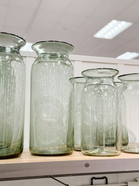 These pale green glass vases are available in three different sizes and add a subtle touch of color to any neutral home decor. They are perfect for holding fresh or faux florals (or not!) on your dining table, sideboard or shelf. home decor accessories living room decor dining room decor built in styling console table decor 

#LTKstyletip #LTKfindsunder50 #LTKhome