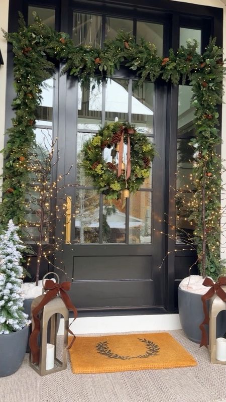 My 2023 holiday porch styling is complete!  I love this simple yet elegant style!  Everything, except the lanterns are in stock!  I linked very similar lanterns here.

Pottery Barn, Frontgate, McGee & Co Amazon home decor

#LTKHoliday #LTKVideo #LTKCyberWeek