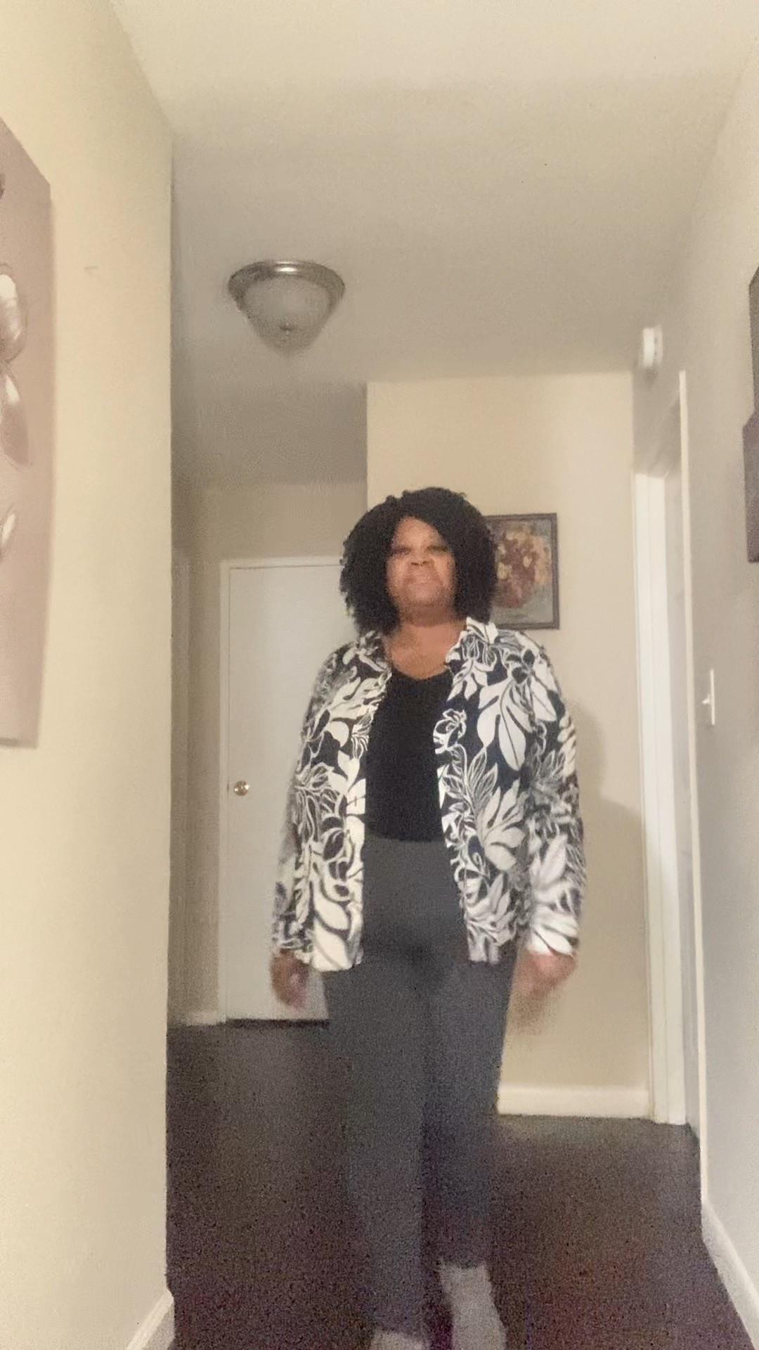 Plus size Talbots black and white floral blouse with grey pants and grey boots 

#LTKOver40 #LTKootd #LTKPlusSize