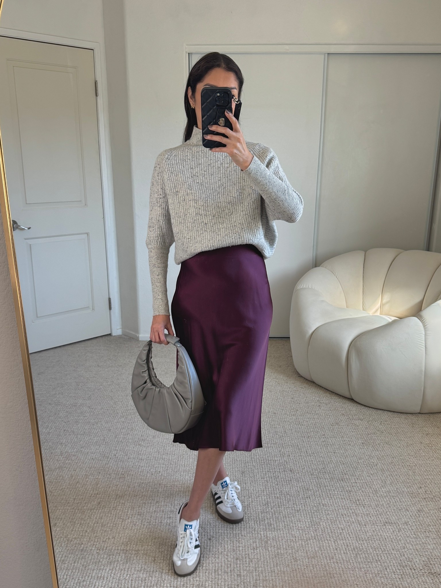 Autumn Outfit Ideas 🍁
STYLING GREY + ADIDAS SAMBA SNEAKERS
.
OUTFIT IDEA DETAILS: 
-Wearing sweater size S
-silk skirt size S
.
This season is all about smart layering — think trench coats, blazers, and soft cashmere knits that elevate any look. Add a vest or cardigan for extra warmth, and you’ll be ready for those unpredictable autumn days. Here’s your reminder that effortless layers are the secret to looking polished no matter the temperature.

Save this for your next autumn outfit inspo!

🧥 #AutumnOutfitIdeas #FallOutfits #LayeringLooks #TrenchCoatSeason #fallstyleinspo 
#outfitideas #stylingtips #whattowear

🗝️ style styling autumn fashion ideas styling inspiration outfit inspiration ootd high street style outfits smart casual outfit autumn style workwear ideas outfitinspo casual style autumn outfit what to wear affordable fashion fall fashion ideas ootd work outfits capsule wardrobe, fall outfit ideas