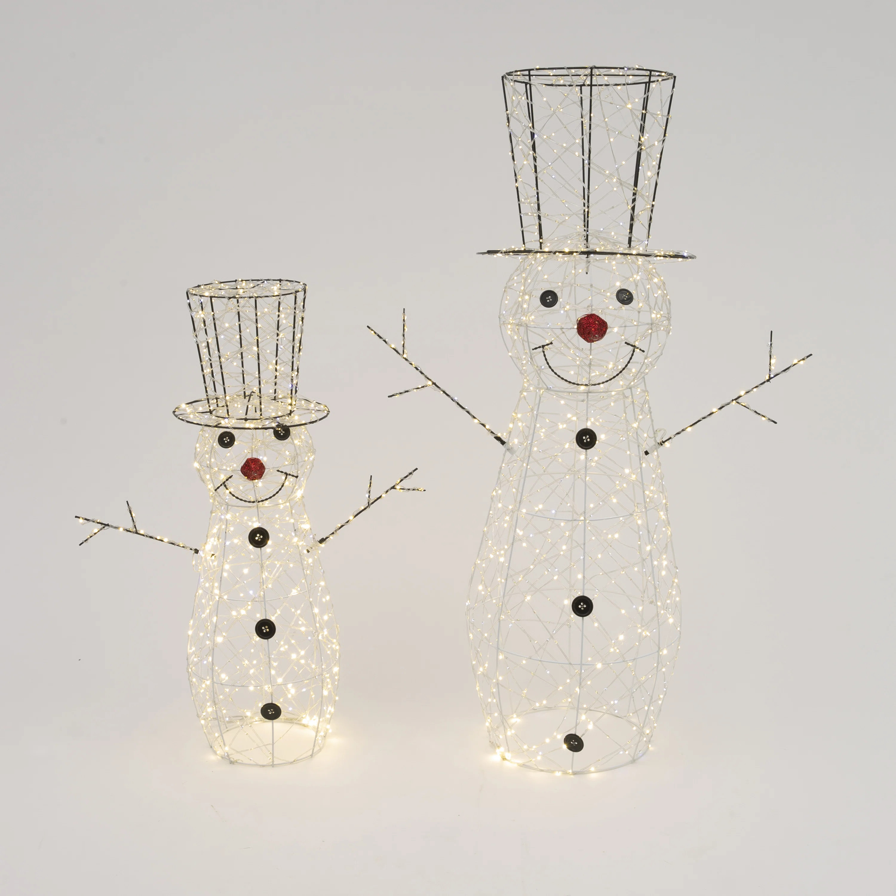 Set of 2 Lighted Holiday Snowmen with Electric Plug In Display | Wayfair North America
