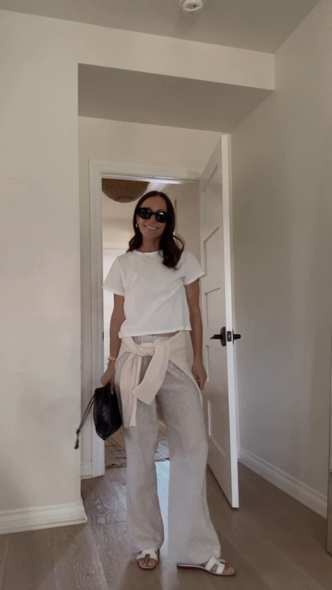 Today’s outfit in easy striped linen pants and a white tee 
I’ve had these linen pants for 3 years. Short gal friendly in the petite style. Stripe print is updated for this season. 

#LTKPetite #LTKOver40