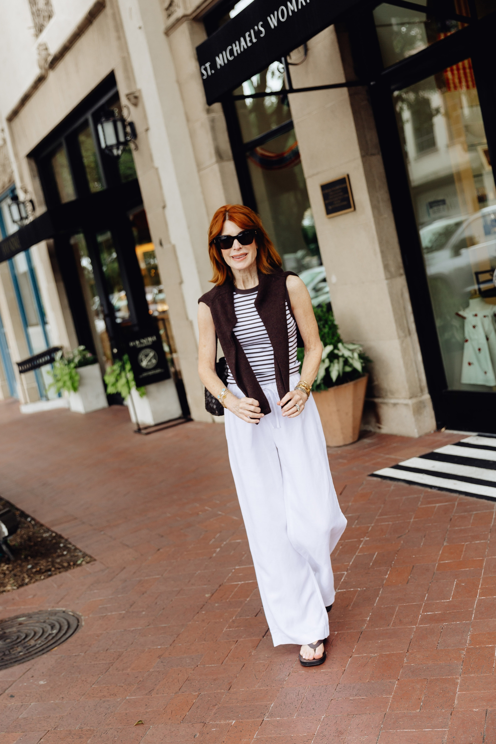 An effortless summer outfit formula I’ll wear again and again — a striped tank, breezy white linen pants, flat sandals, and a lightweight sweater layer. Perfect for travel outfits, errands, or casual summer dinners. Wearing an XS in everything. #SummerOutfitsOver40 #VacationOutfitsBeach #TravelOutfits 

 

#LTKootd #LTKOver40 #LTKootd #LTKSeasonal #LTKOver40