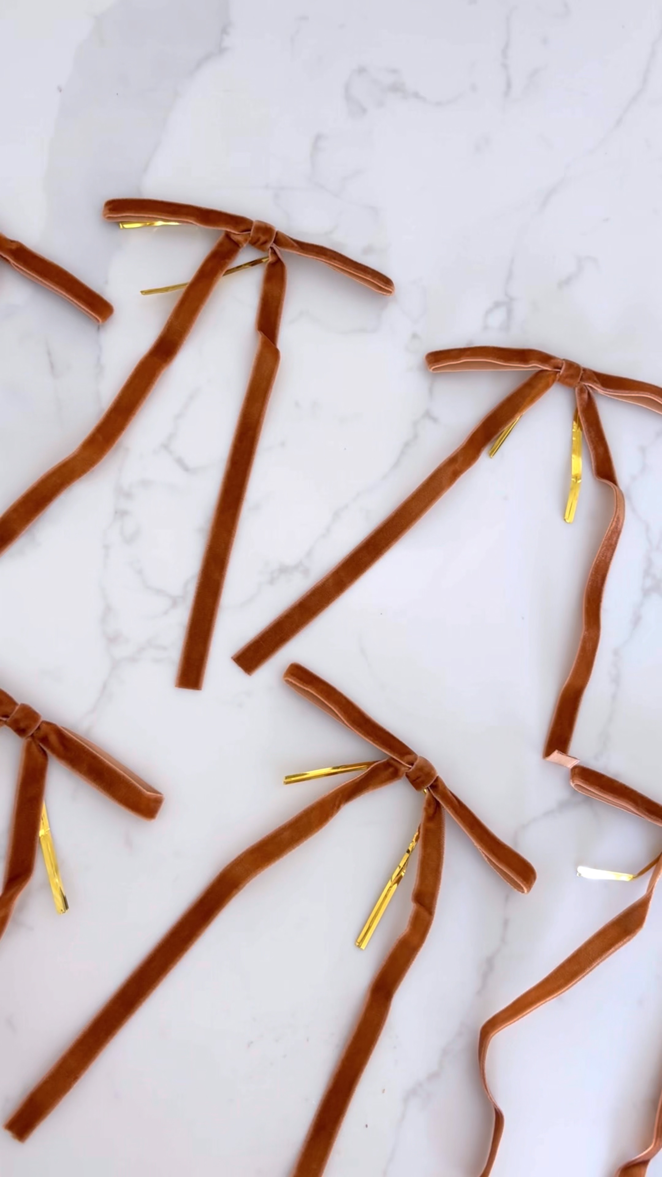 Pack of 30 skinny velvet ribbons for only $13! I got a set in copper but there are so many other colors including red, green, blue and pink! Tie these to your Christmas trees, wreaths, garland or gifts!

#LTKHoliday #LTKSeasonal #LTKHome