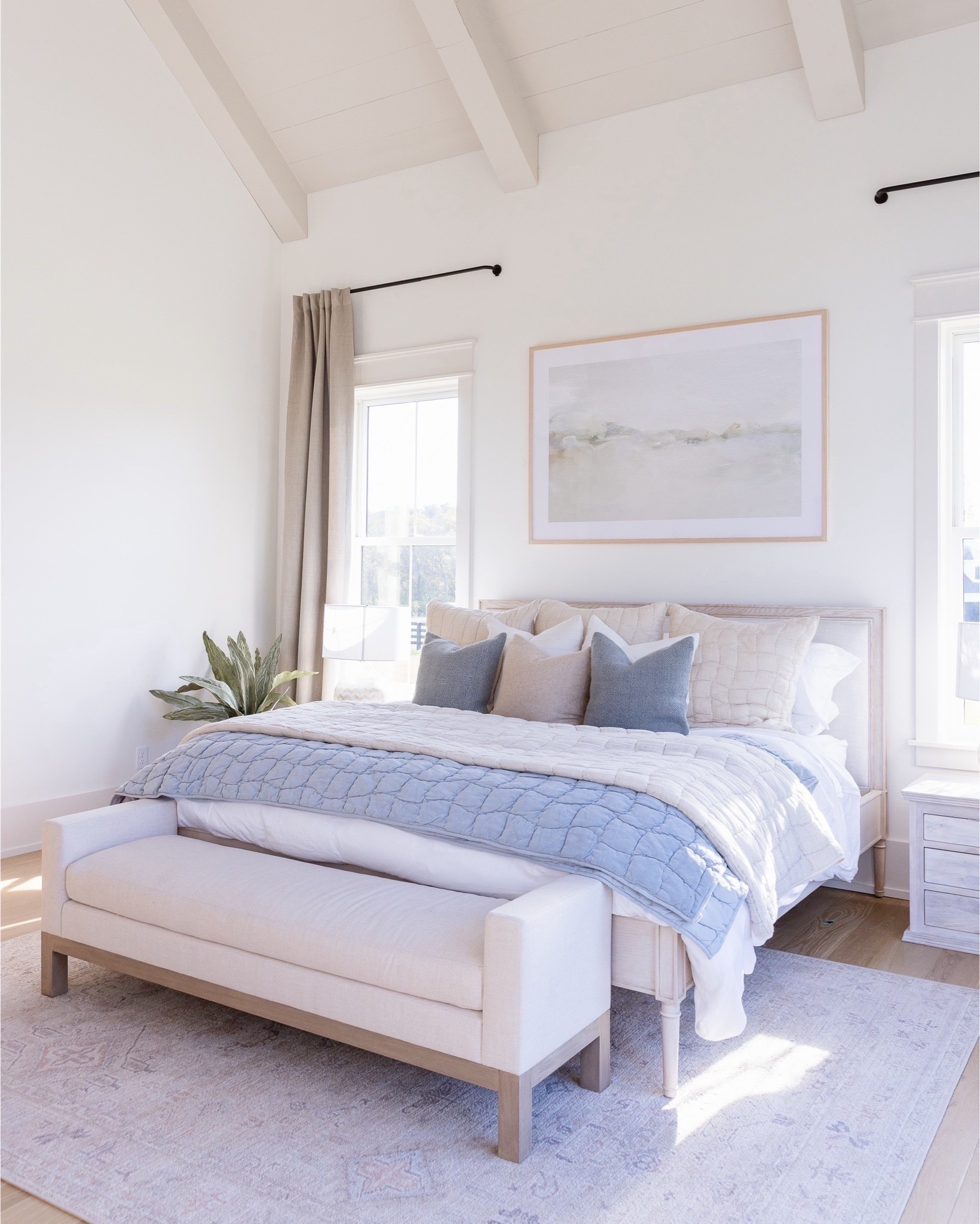 A light and airy bedroom where you can swap out the blues for a color palette that suits your home. The foundation of the bed is all neutral.

#LTKOver40 #LTKHome