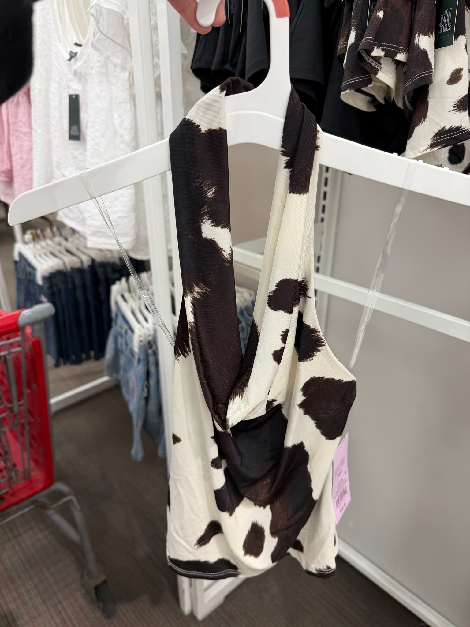 Okay but this brown cow print cowl halter from Wild Fable is SUCH a moment. Cow print is so popular right now and this is the cutest way to try the trend without going overboard.  It’s giving cool girl western but still wearable.
date night outfits, vacation outfits beach, easter basket stuffers, spring outfits, work outfits, rodeo outfit inspo, easter dress women, spring dresses, resort wear 2026, country concert outfits, target style, cow print top, western trend, spring fashion trends, going out tops 

 #LTKgrwm #LTKootd