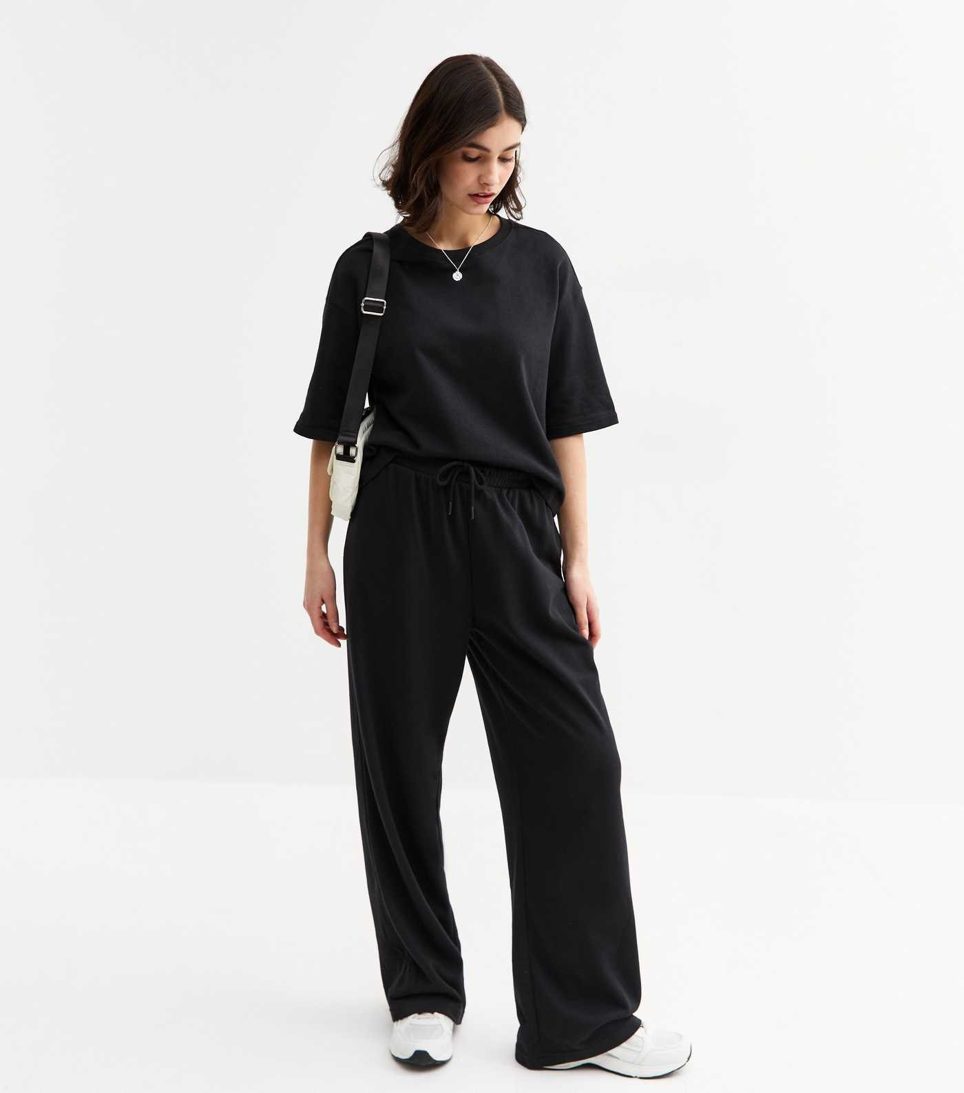 Black Drawstring Wide Leg Joggers
						
						Add to Saved Items
						Remove from Saved Items | New Look (UK)