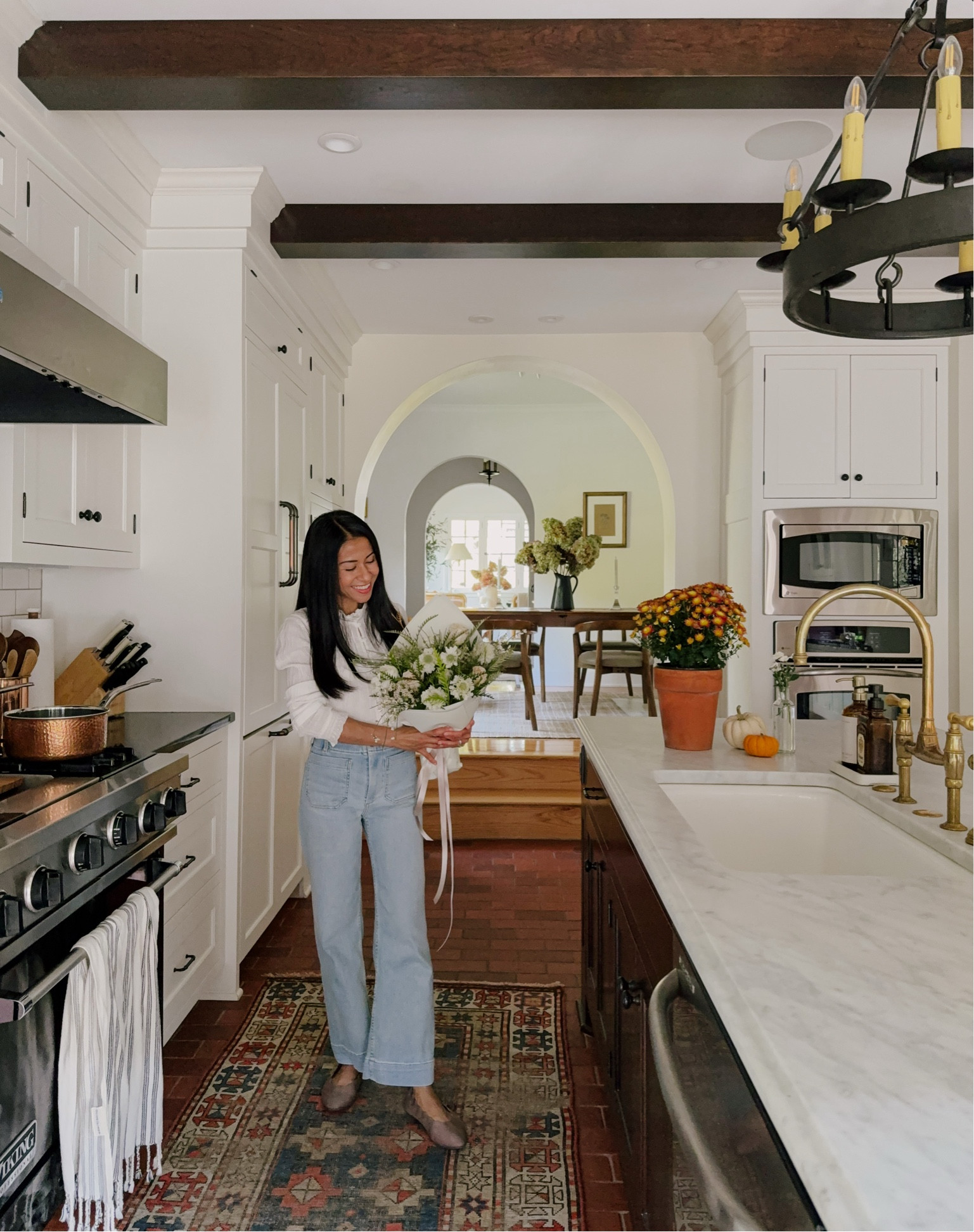 Fall kitchen and outfit  Love these wide-leg jeans! They are so soft and super comfortable that I bought in other colors. Wearing a size 23 standard in the Korat Wash. And my blouse is 22% off | fall outfit, kitchen decor

#LTKSaleAlert #LTKStyleTip #LTKHome