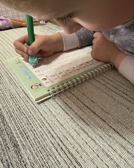 Kids writing toddler writing alphabet numbers drawing addition subtraction multiplication division drawing math homeschool magic pens magic writing reusable school learning must haves

#LTKfamily #LTKGiftGuide #LTKkids