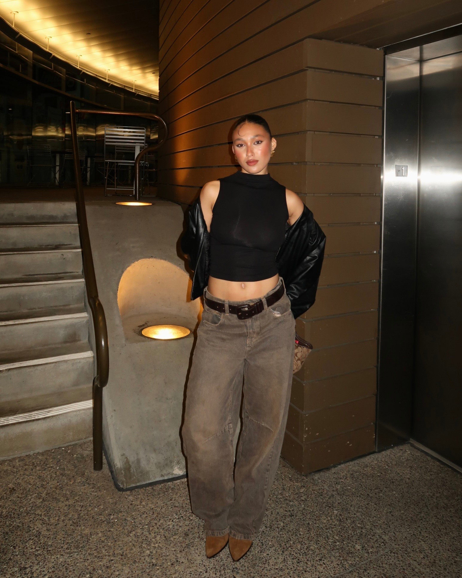 Going out casual date night outfit💕 brown baggy jeans, brown suede kitten boots, black leather jacket, black sleeveless top, coach bag

#LTKStyleTip #LTKSeasonal #LTKSpringSale