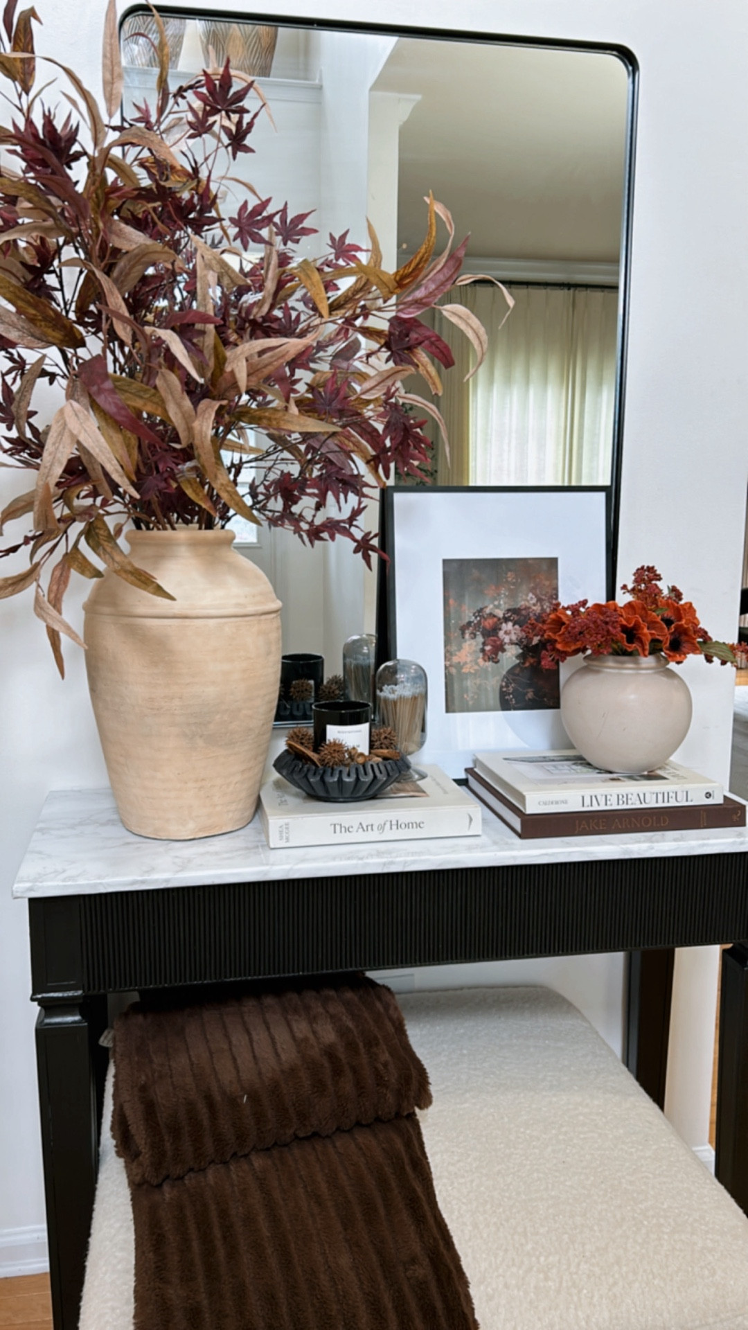 FALL ENTRYWAY STYLING🍂
#fall2025 #entryway #stylingmyhome #vases #fallflorals #coffeetablebook #marble #moodyartwork #blanket #fallentryway #amazonhome #targethomedecor

#LTKFindsUnder50 #LTKSeasonal #LTKHome