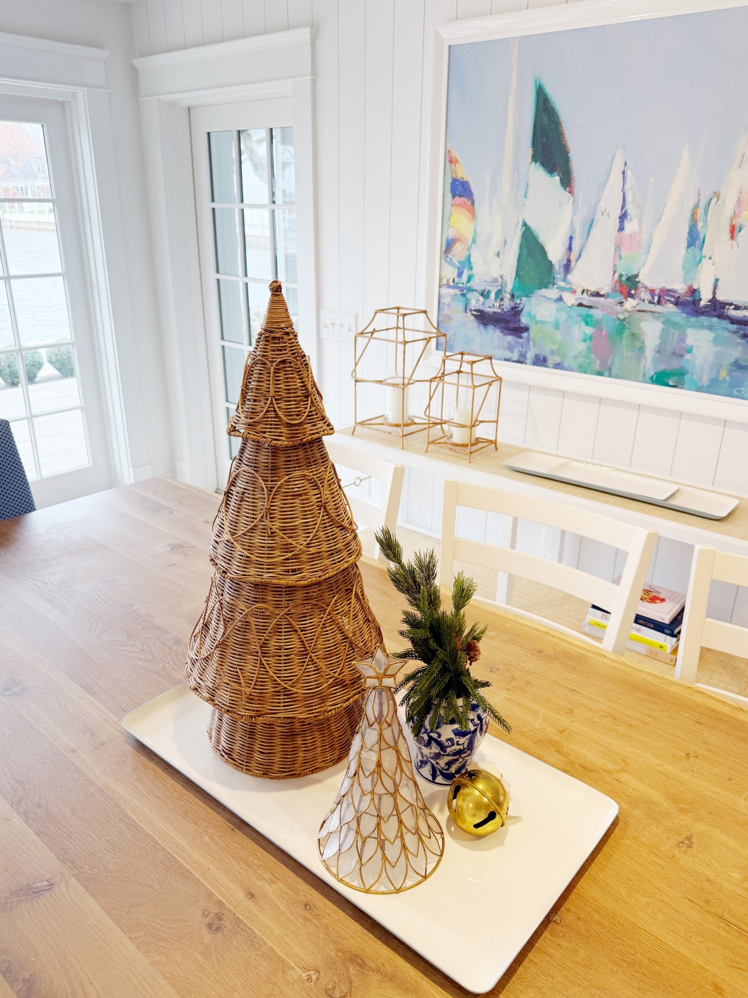 Holiday decor centerpiece for the kitchen table at the lake! Mixing in raffia and gold for a coastal and cozy arrangement ✨🎄



#LTKGiftGuide #LTKHoliday