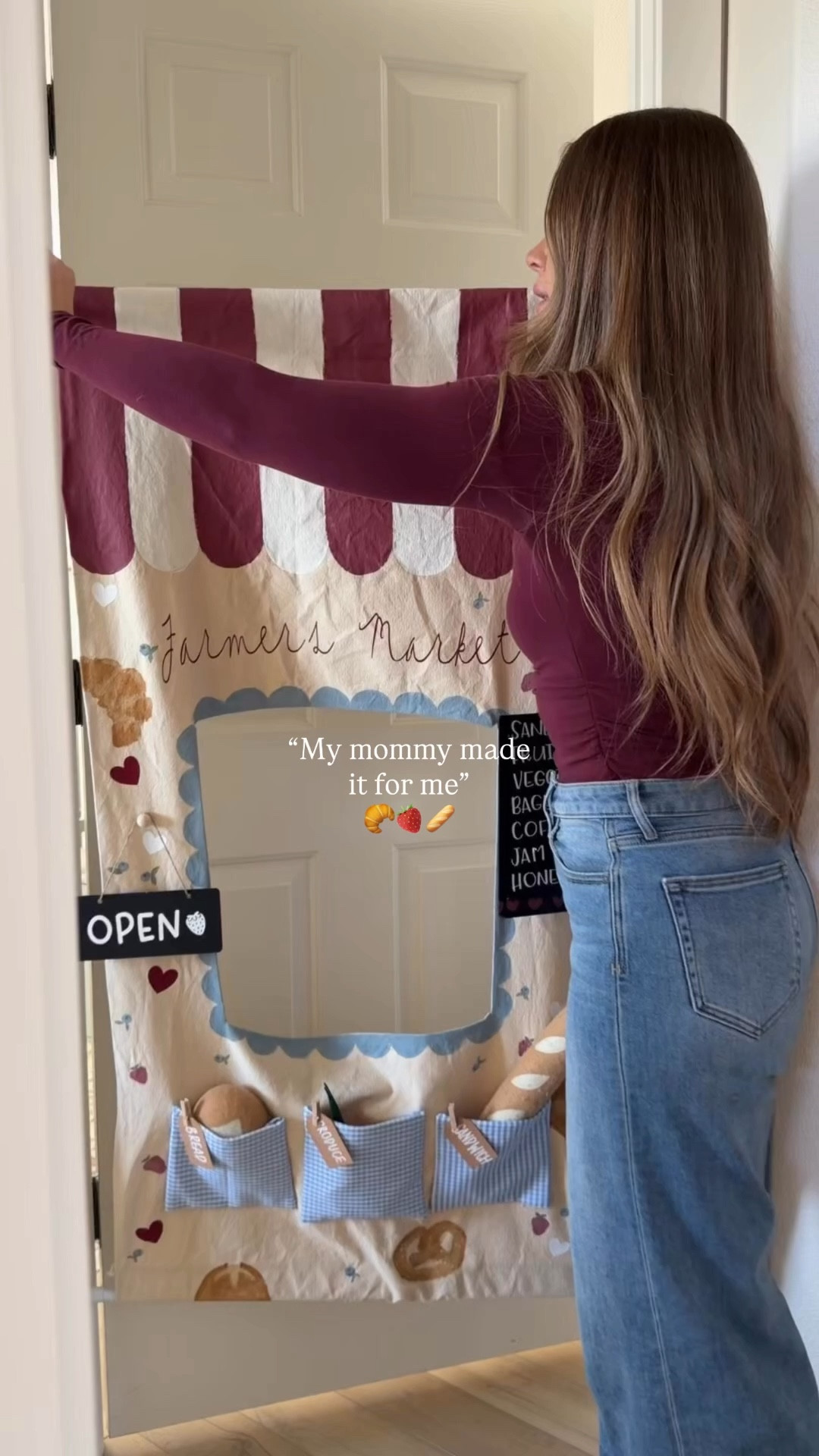 Here’s how I made our canvas door shops! ￼
You are going to start by cutting out your canvas fabric. You can go off of your door size or your child’s height! For mine, I did 4 feet x 30 inches.

Next, you are going to cut out your window. Once this is done, you are going to either use hot glue or stitch witchery to fold over all of the edges and adhere them down! This will keep your edges from fraying :) Make sure you do this to the edges inside your window too! ￼

I drew my design with pencil first! You can use fabric paint or acrylic paint that is mixed with fabric medium. Fabric medium keeps your paint from cracking!

For the pocket, I cut out canvas squares and then covered them with fabric. I just used hot glue for this part. Then I hot glued them onto the canvas! ￼

I made their signs using my Cricut, but you could also paint them on! ￼

I put a tension rod at both the top and the bottom. You can just do one at the top, but having one at the bottom keeps your pocket from folding forward!

To create the pocket to slip the tension rod into, I just folded over the canvas and hot glued it down! ￼


#LTKBaby #LTKKids #LTKmomlife