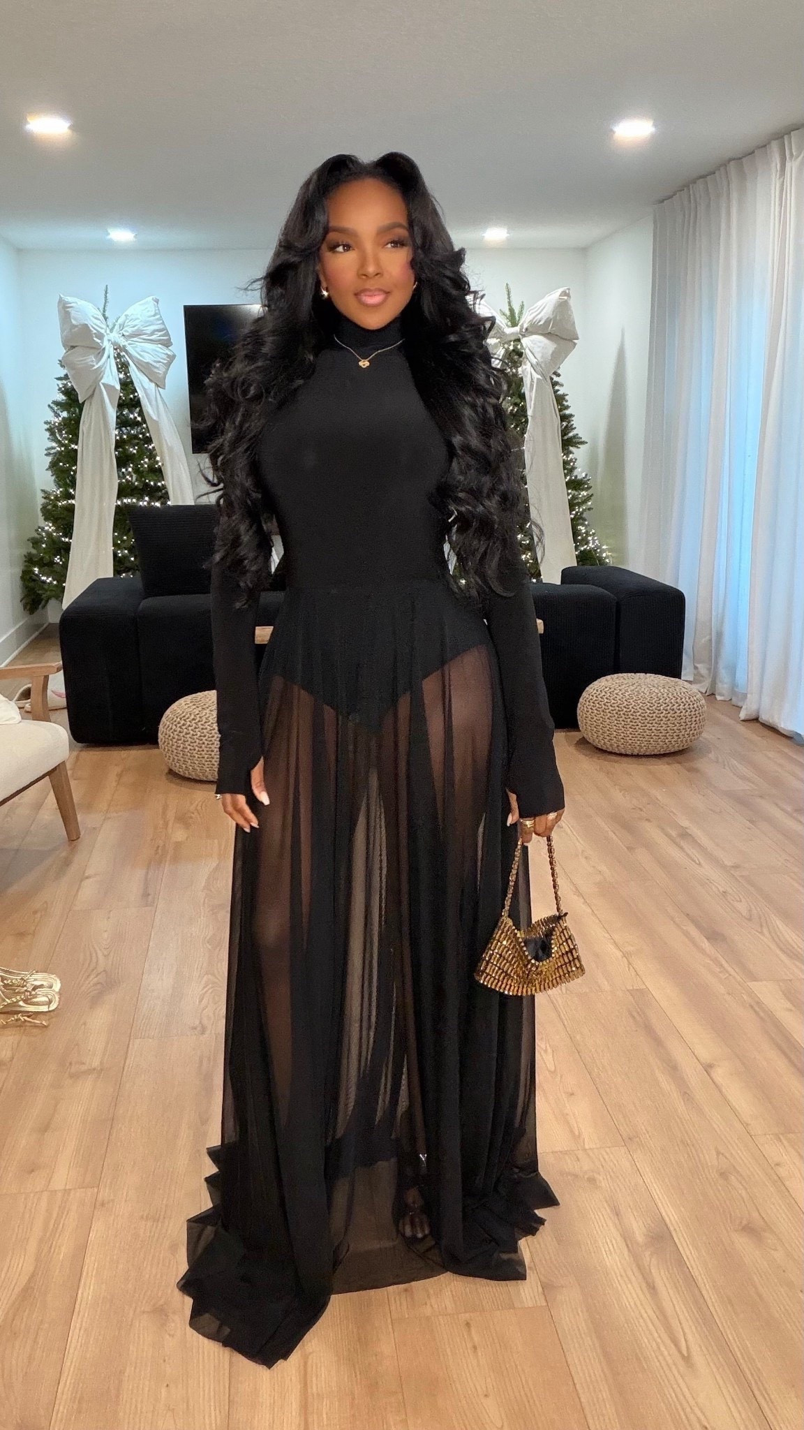 A dramatic all-black moment — sleek, sheer, and made for holiday nights when you want to turn every head. The movement on this skirt is unreal and pairs perfectly with a fitted top for that sculpted, elegant silhouette.

Perfect for holiday parties, evening events, and elevated night-out looks.

📏 Sizing: Top — Small | Skirt — Small | Bag — One Size  
Height — 5’4” | 138 lbs | Bust — 34D | Waist — 27" | Hips — 40"

Tap to get details and shop the full look.

Sheer black maxi skirt outfit ideas, elegant night-out style inspiration, elevated holiday fashion, all-black evening outfit, chic dramatic skirt styling

Follow me on Instagram and YouTube @kirasfashionfinds



#LTKstorytime #LTKgrwm #LTKootd