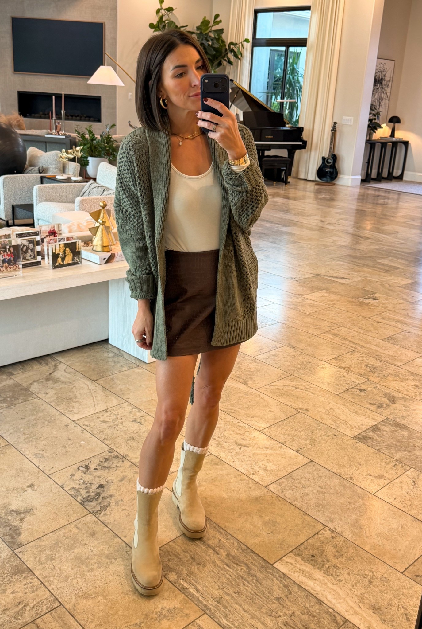 The sweater tagged (looks red) is actually the sweater pictured! Sorry for the confusion but I promise it’s correct!