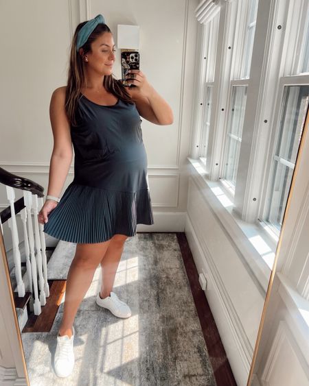 Sported this pleated dress while pregnant. Wearing 2X (would wear 1X now post-pregnancy). On sale for 50% off! 

#LTKplussize #LTKsalealert #LTKbump