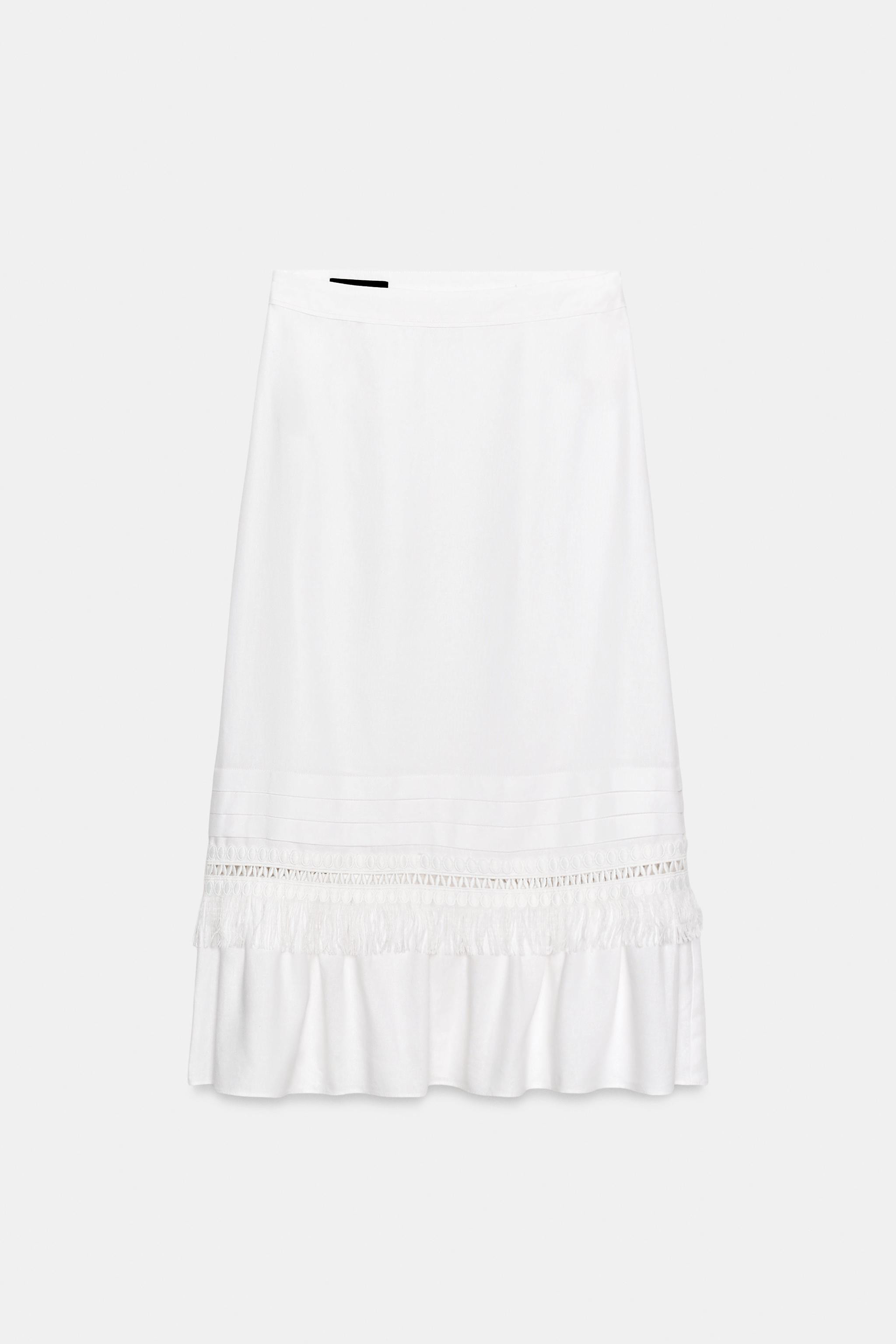 Model height: 180 cmMidi skirt made of a linen blend. Featuring a pleated hem with fringed and ru... | Zara UK