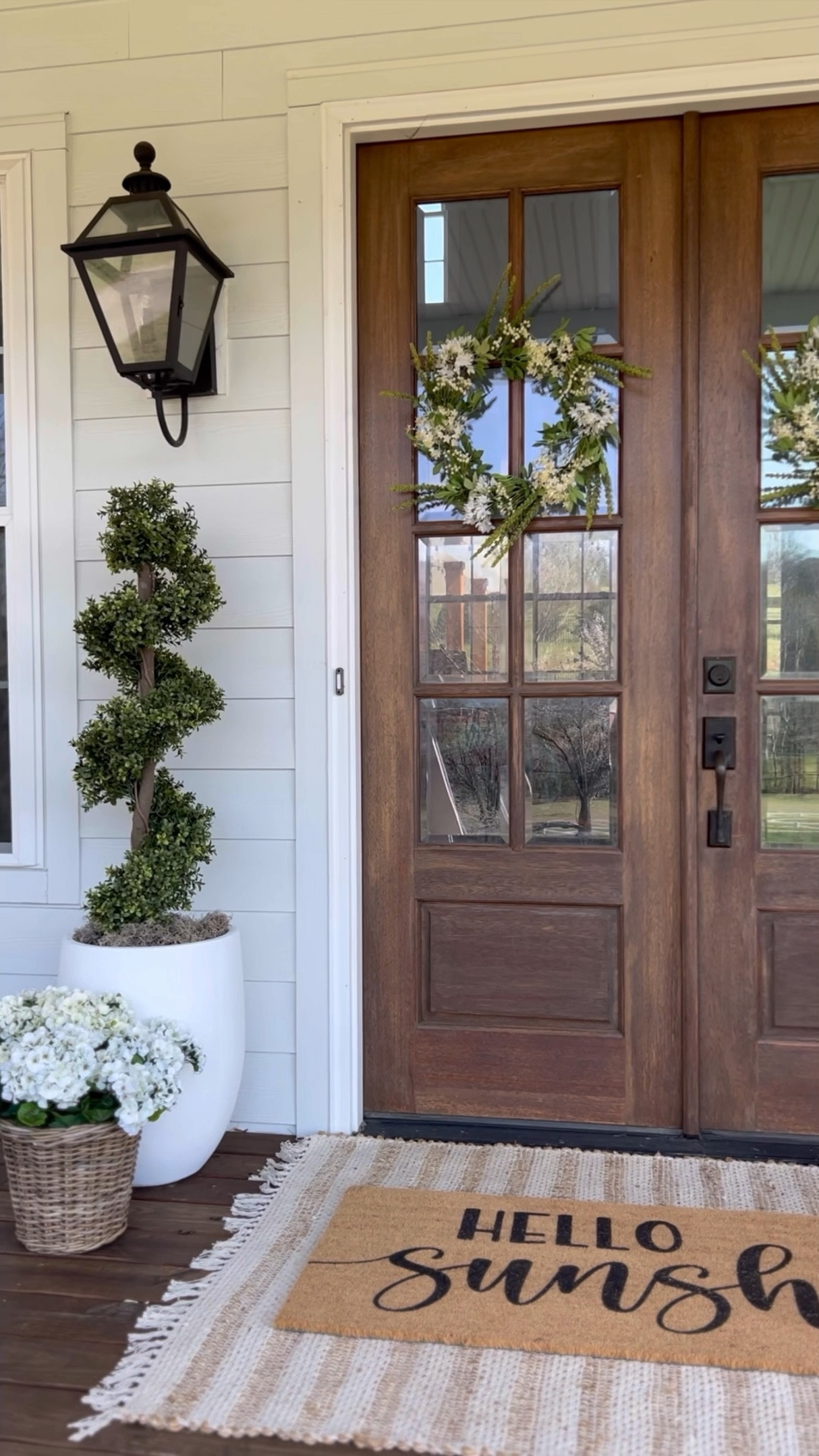 30% off sale! Front porch and front door decor trending viral home decor artificial faux plants trees flowers florals greenery faux geraniums hydrangeas doormat and jute scatter rug layered double modern farmhouse southern porch eucalyptus tree African sunflower wreath lantern, outdoor light fixtures, wall sconces lighting jute rug is 4x6  and doormat is 2x5 spring and summer home decor

#LTKSeasonal #LTKhome #LTKstyletip