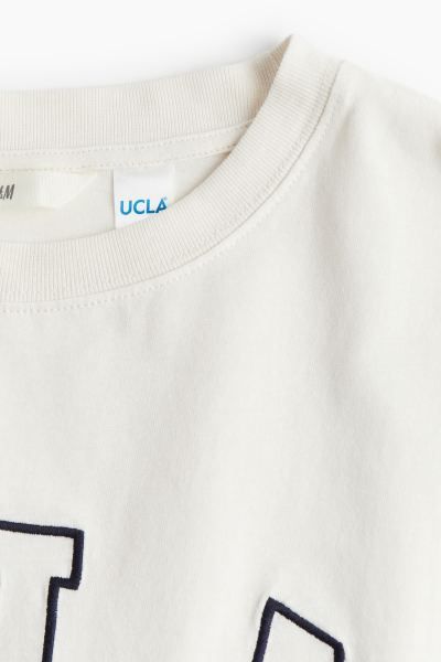 Oversized Printed T-shirt - Cream/UCLA - Ladies | H&M US | H&M (US + CA)
