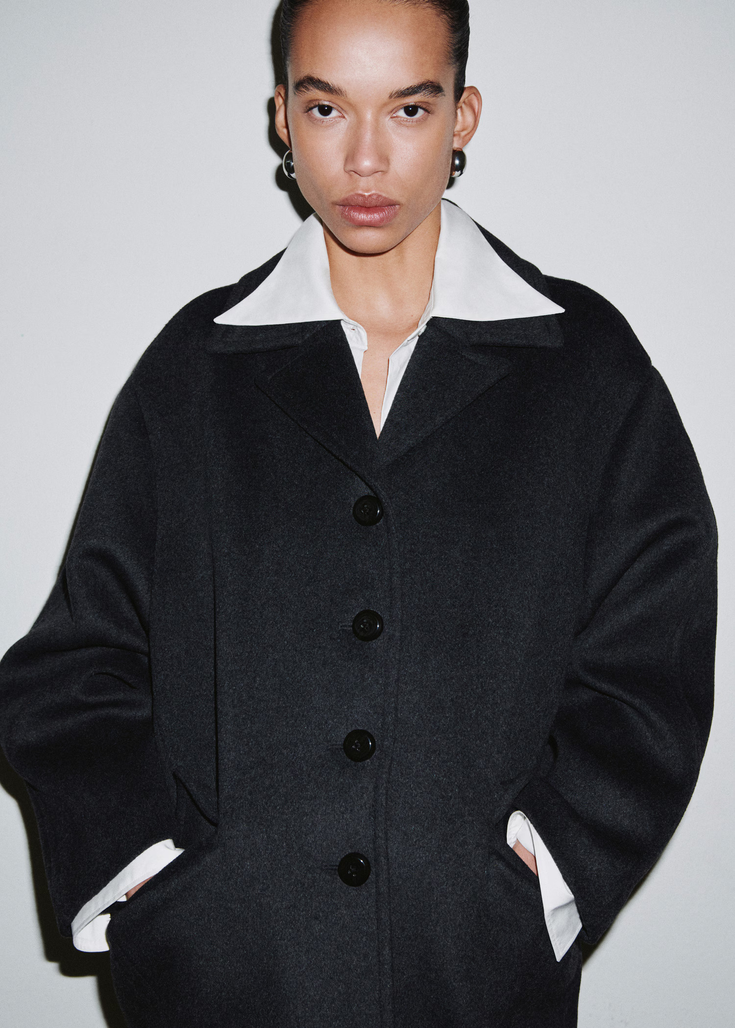Wool-blend coat with button fastening | MANGO (UK)