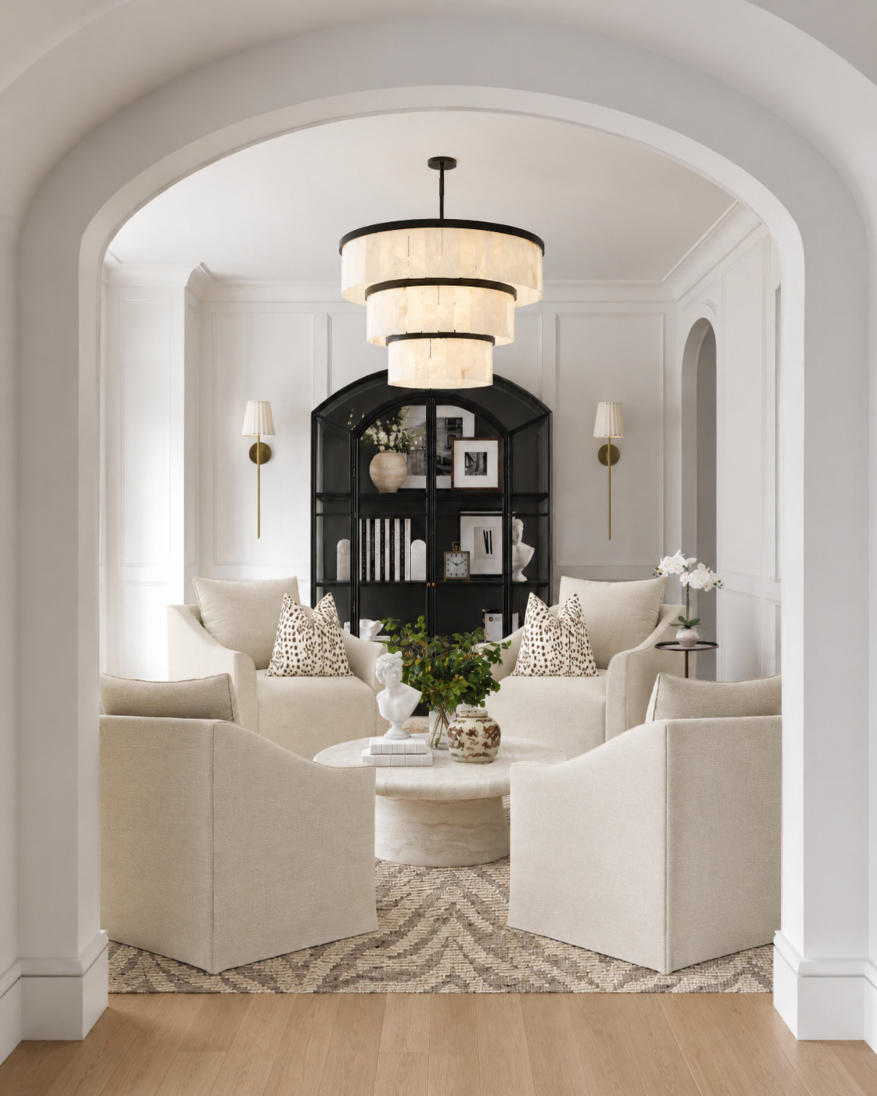 Soft neutrals, sculptural pieces, and a little contrast for the perfect collected living room moment 🤍

I love how the black arched cabinet grounds the space while the cream chairs, marble coffee table, layered lighting, and patterned pillows keep everything feeling soft and timeless. Proof that neutral doesn’t have to feel boring.

Shop the full look in my LTK.

#LTKHome #LTKFinds #LivingRoomDecor #NeutralHomeDecor #ClassicInteriors #ArchedCabinet #MarbleCoffeeTable #HomeDecorFinds #ShelfStyling #RiverAndVineDesign 

 #LTKHome