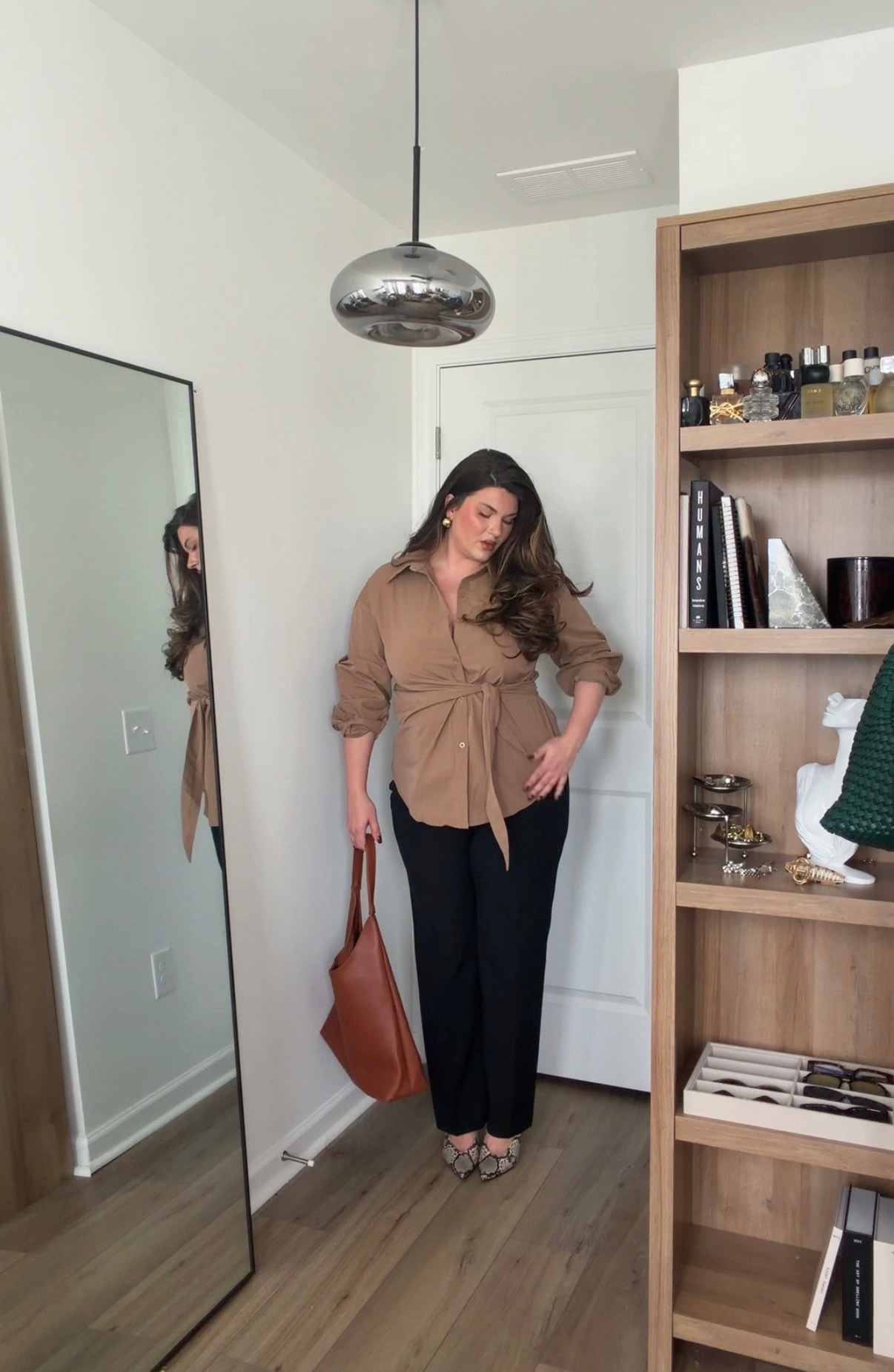 Wearing XL in the top ( true to size) and a 14 in the pants (run a teeeeeeeny bit small in the waist but not enough to go up a size. They are just a slim fit)

#LTKMidsize #LTKWorkwear #LTKootd
