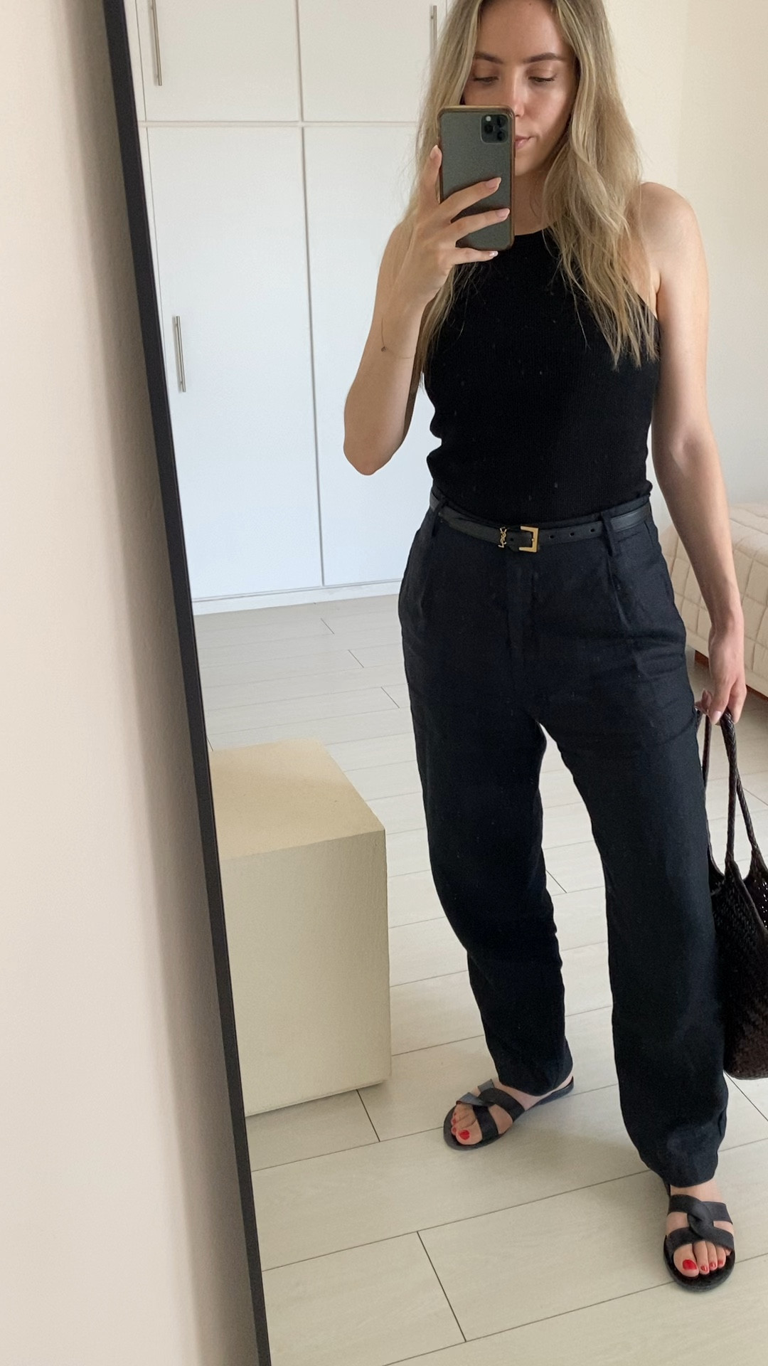 Easy, chic & simple summer total black outfit for everyday✨

-These black linen trousers are so versatile from day to night.
-The Saint Laurent leather belt adds a luxury chic touch to everything.
-My Agolde tank top is sold out but I’ve found 2 perfect alternatives. The first is  a Toteme one on sale and the second one is almost identical.
-The tote bag is just perfection & timeless.
-These black flat sandals go with anything and look polished 👌🏻

#easysummeroutfit #easysummerstyle #minimalsummerstyle #minimalsummeroutfit #allblacksummeroutfit #casualchicoutfit

#LTKstyletip #LTKsalealert #LTKSeasonal