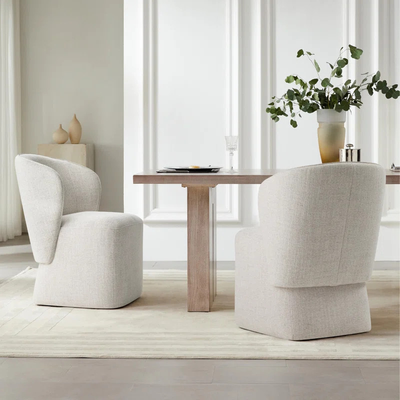 Niha Upholstered Dining Chair with Casters | Wayfair North America