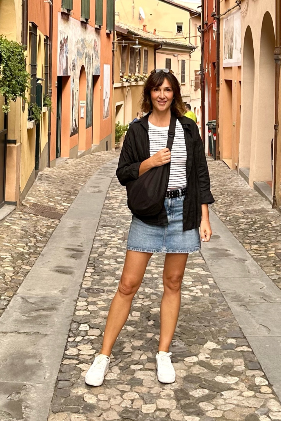 Doing touristy things in Dozza! I’m 5’ 7” size 4ish, wearing:
- M in the tank top, my usual small fit fine too but I felt the band in the built in bra was more comfortable in the M
- size S in the denim skirt
- size S in the linen shirt
- sneakers are super comfy and fit tts
Also linked my bag and belt (fits big, I had to get two more holes added)

#LTKStyleTip #LTKTravel #LTKShoeCrush