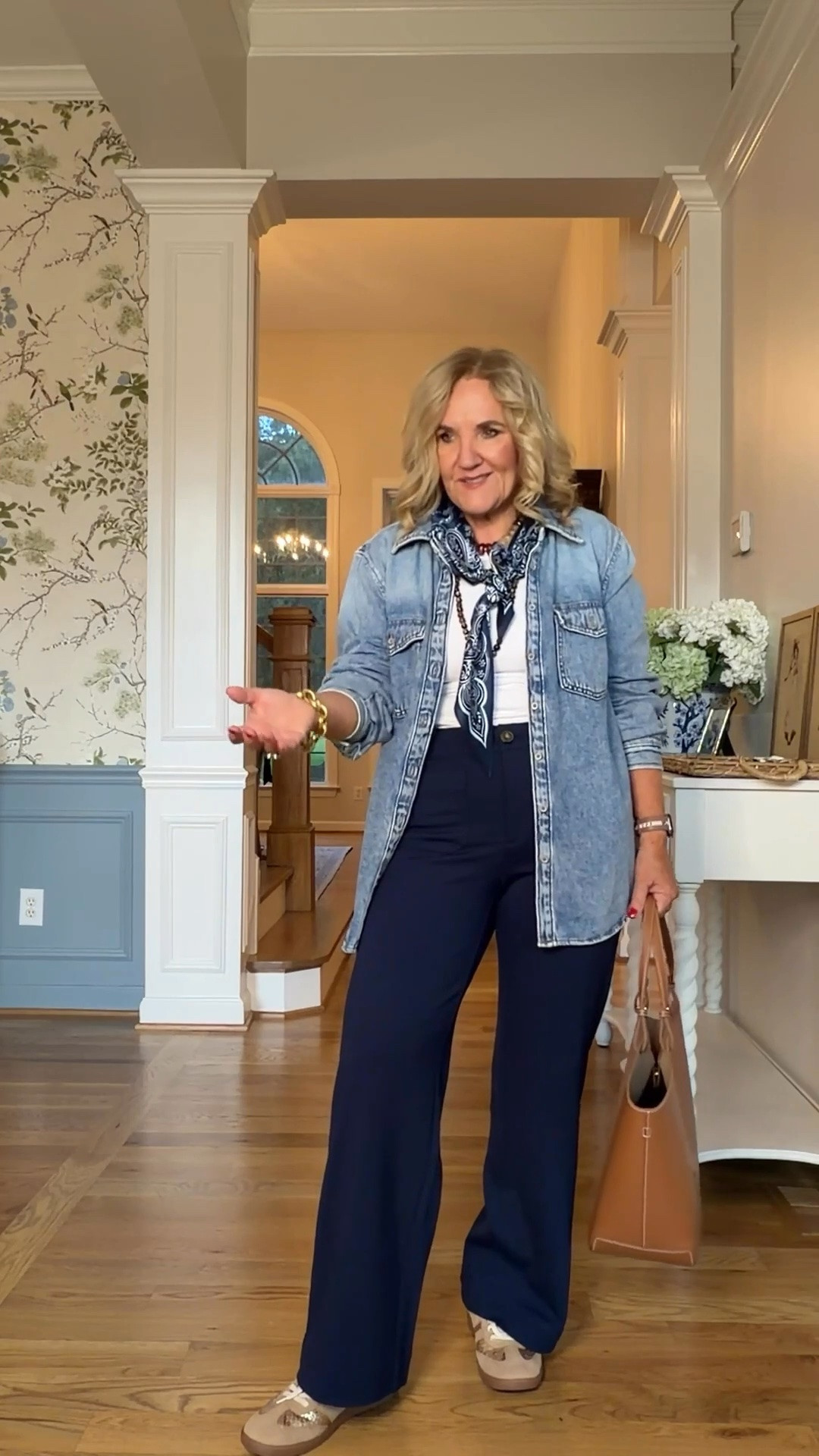 Tap the bell 🔔, heart ❤️ this post, and save for later!

 The relaxed denim shirt adds a casual touch, while the high-waisted wide-leg pants create a flattering, elongated silhouette that works for almost any occasion.

Fit note: For the pants I'm wearing an 8 petite. They fit true to size with a relaxed wide-leg silhouette. The denim shirt has an easy, slightly oversized fit that's perfect worn open or buttoned up.

Style it with a printed scarf and loafers for a classic look, swap in sneakers for travel days, or dress it up with heels and a blazer for the office.

#LTKootd #LTKOver40 #LTKgrwm