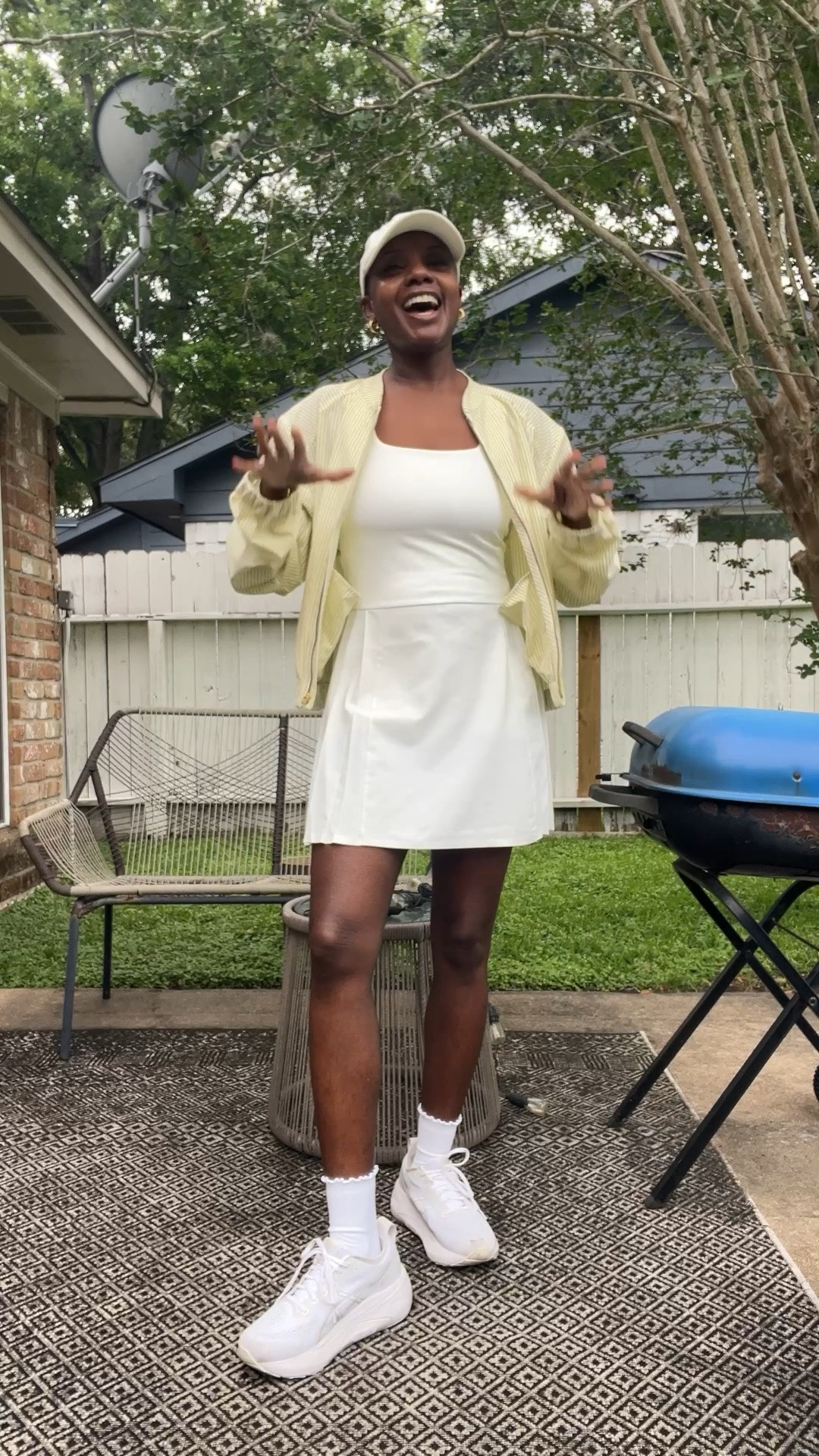 Workout dress!! White pleated tennis dress with a square neckline, built in shorts, side pocket and open back for easy restroom access. The yellow and white striped jacket is so lightweight and pretty. White ASICS sneakers and white socks with lettuce hem.

#LTKdayinmylife #LTKgrwm #LTKActive