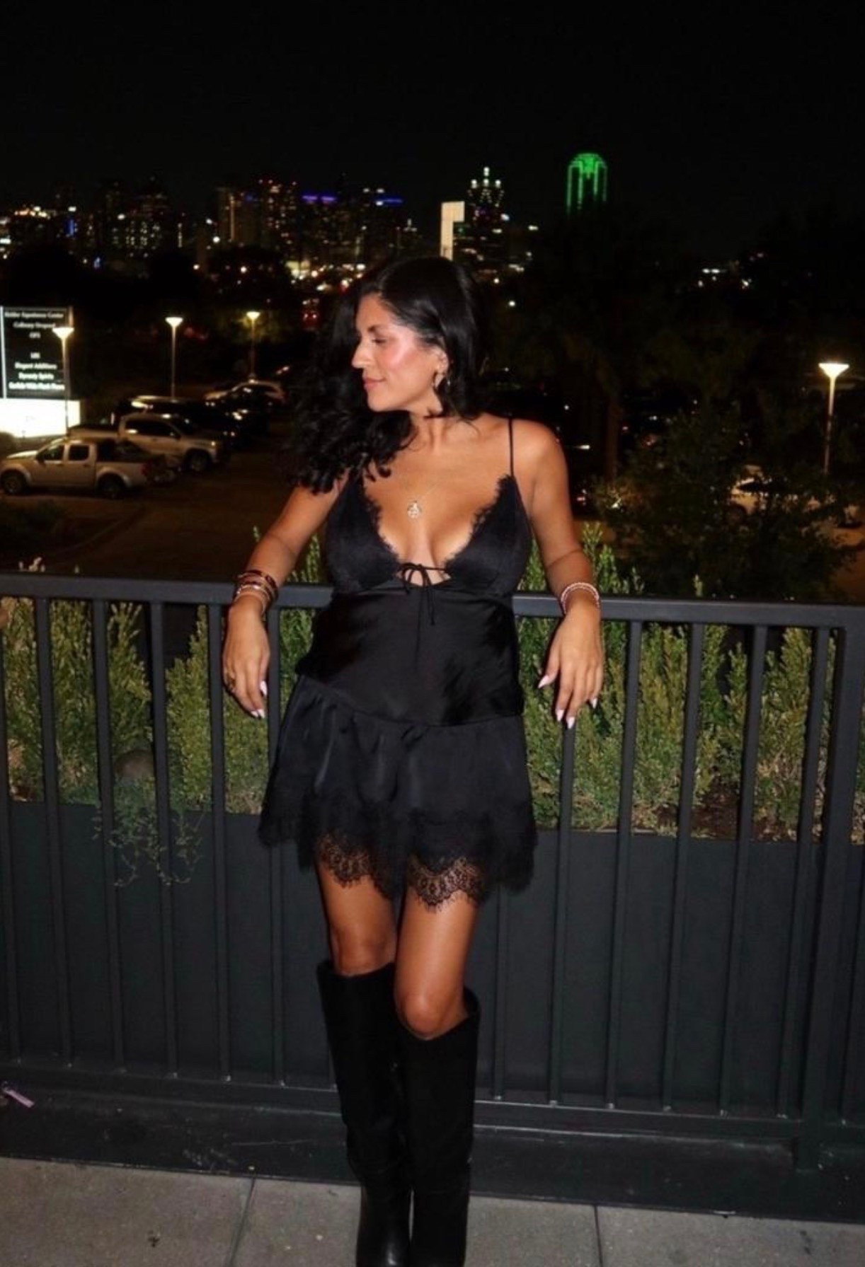 A little black dress with a romantic twist 🖤 Lace details, knee-high boots, and the prettiest feminine silhouette make this such a good night-out look.