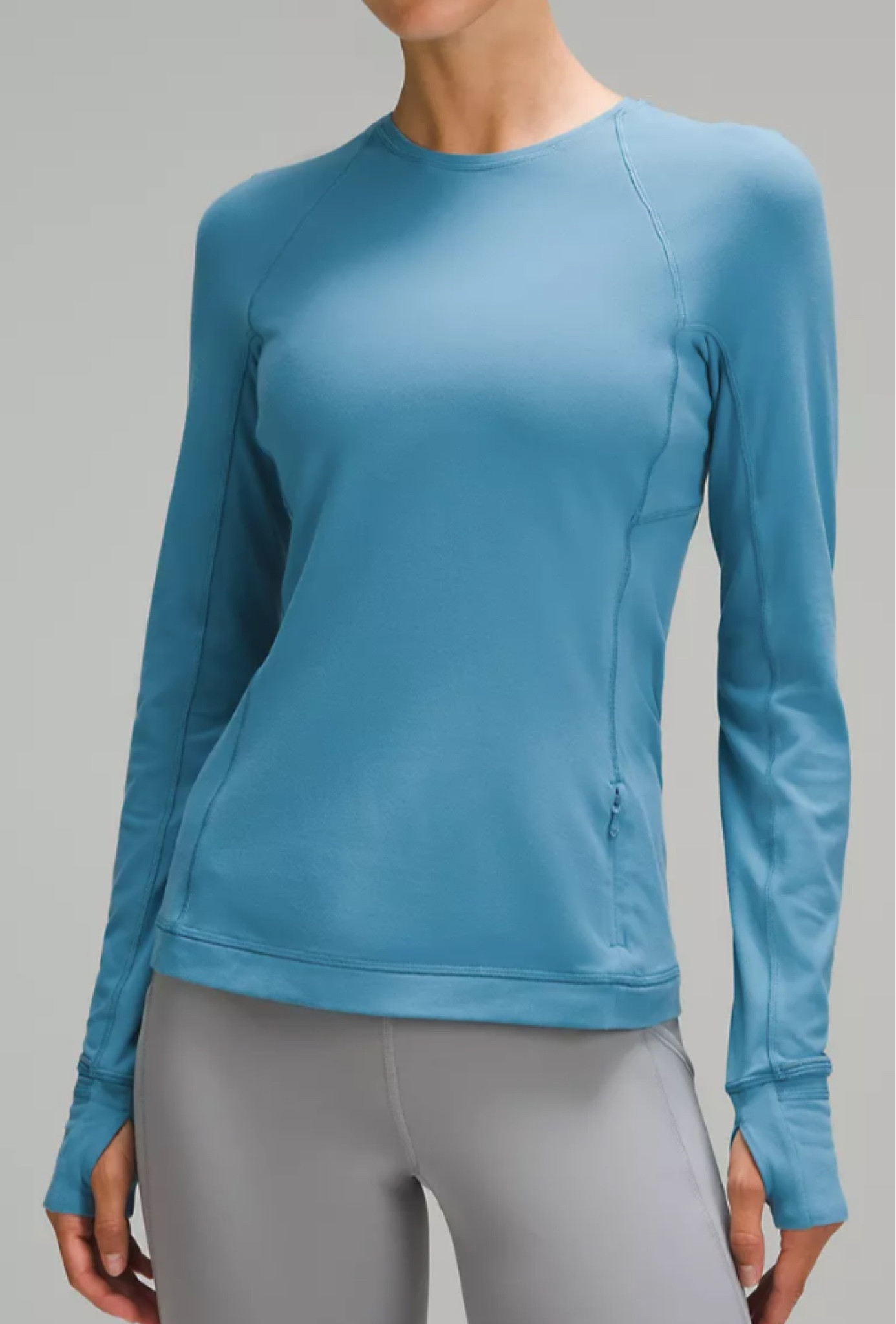 It’s rulu long sleeve shirt in ‘marlin’ from lululemon 

Peacock 

#LTKtravel #LTKfitness #LTKstyletip