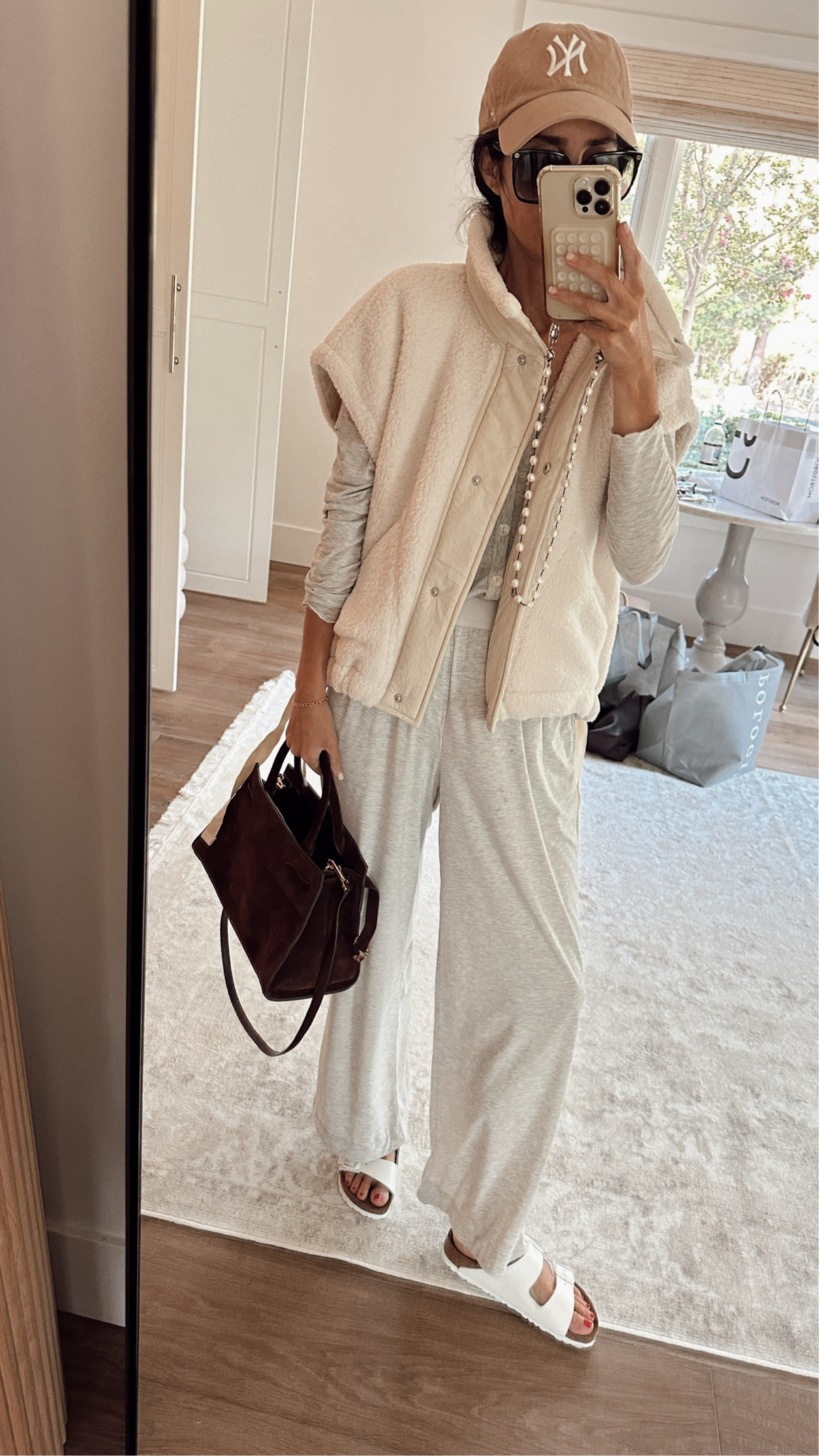 SCHOOL DROP OFF
Running late so threw this super cozy oversized vest over my pajamas, added a hat, shoes, sunnies with no makeup #stylinbyaylin #aylin

#LTKSeasonal #LTKStyleTip #LTKActive