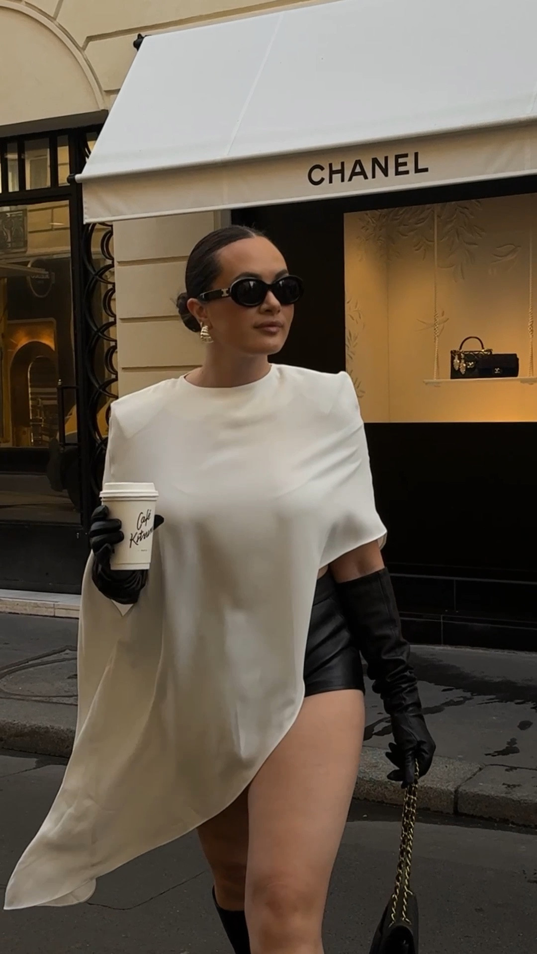 Chic black and white outfit for Paris - love this cape

#LTKSeasonal #LTKFindsUnder100 #LTKStyleTip