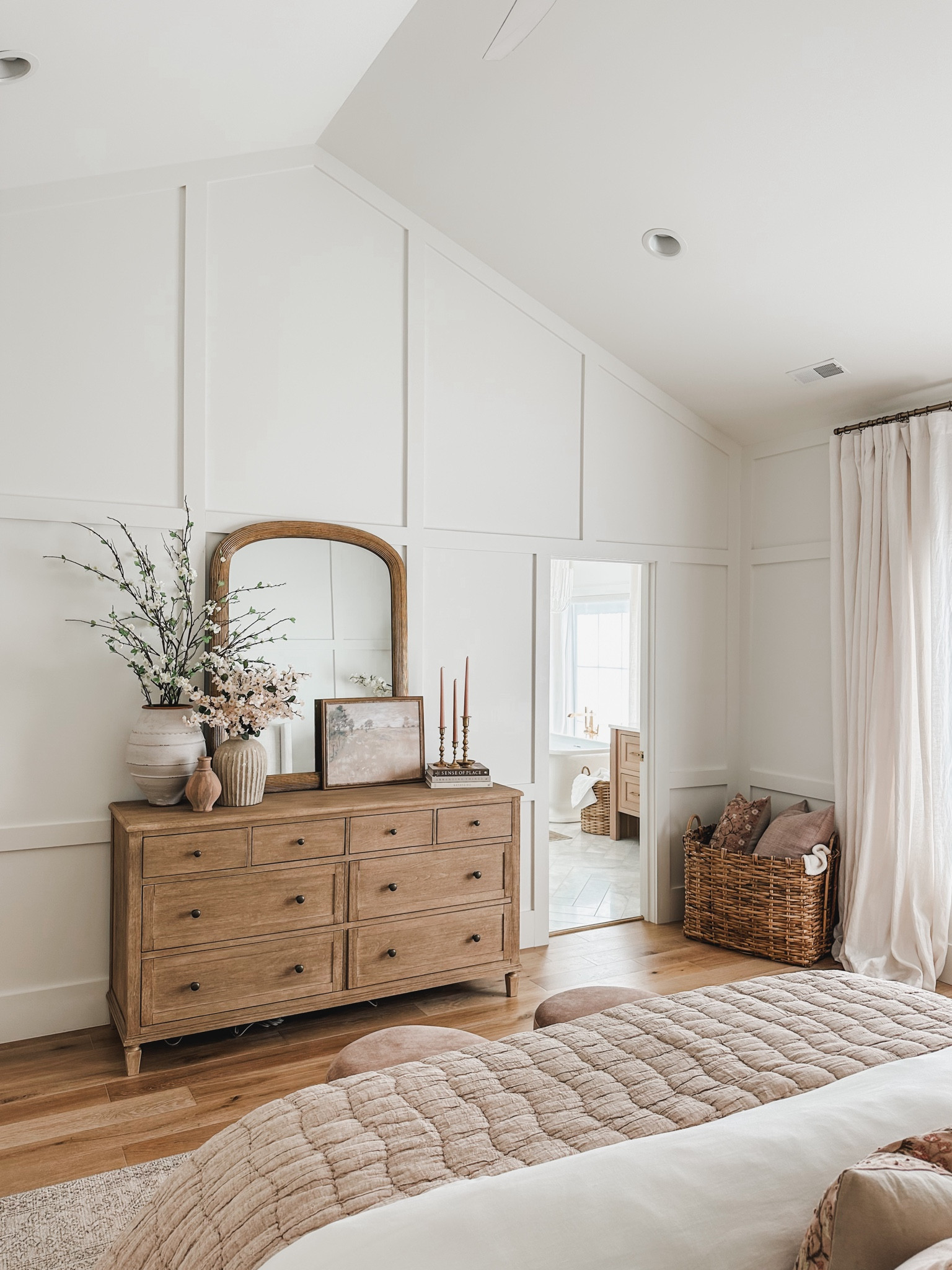 Light and bright Pottery Barn style primary bedroom with neutral wood tone furniture, creamy whites, and pops of pink!

Home finds, bedroom refresh, neutral wood tones, dresser favorites, gold mirror, cozy bedding, linen curtain, basket faves, throw pillow, faux florals, light and bright, neutral home, Pottery Barn style, found it on Amazon, Walmart home, gold detail, ottoman faves, wicker basket, aesthetic finds, shop the look!

#LTKSeasonal #LTKStyleTip #LTKParties