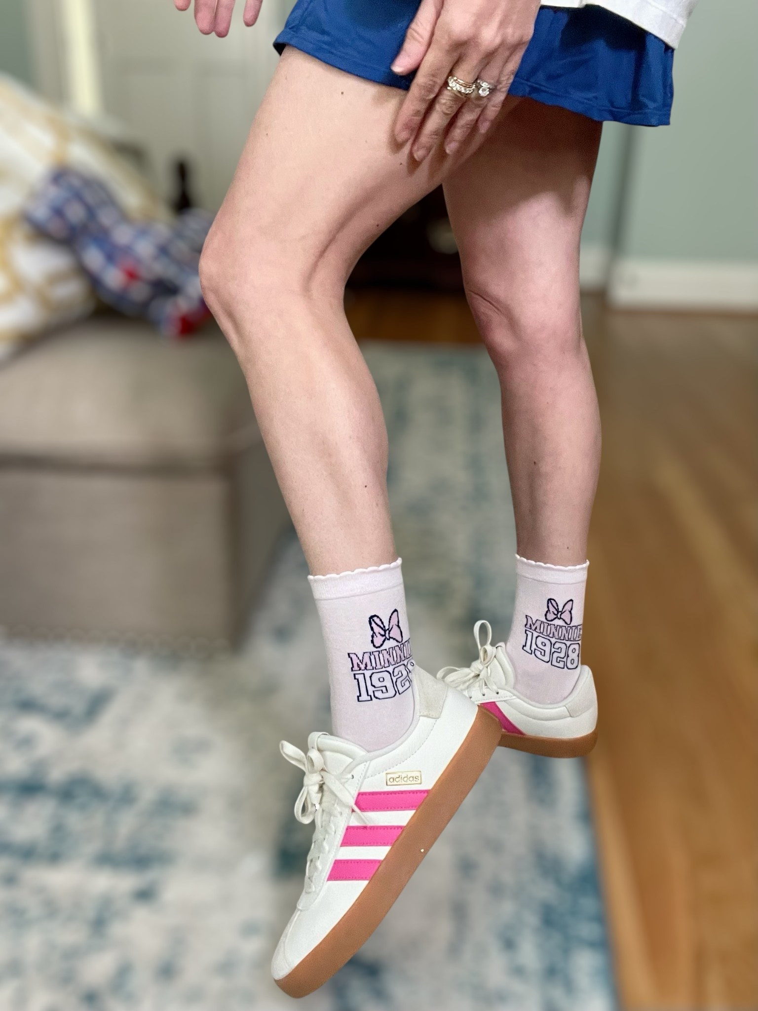 💗 Use code PREPPYREBEL for 10% off my Melinda Maria jewelry stack! #MelindaMariaPartner 💛💫

🎀 Sporty meets sweet with this adorable Minnie & Daisy graphic tee + retro sneaker moment! Whether you’re headed to the parks, running errands, or just channeling some nostalgic Disney vibes, this look is full of playful personality and comfy-cute details!

👕 Tee: Minnie & Daisy Athletic League graphic shirt from Target – oversized, lightweight, and full of vintage varsity charm 💖
🧦 Socks: Disney x Skinnydip Minnie Mouse crew socks – I couldn’t choose just one, so I styled both the pink “1928” pair and the white laureled Minnie!
👟 Sneakers: Adidas sneakers with pink stripes for that perfect pop 🎀
🎀 Headband: Pink knotted headband to tie in the Minnie theme 💗
💍 Jewelry: Layered Melinda Maria necklaces – Lil Frankie Chain + Not Your Basic Samantha Tennis Necklace in Blue Opal (code PREPPYREBEL saves you 10%!)

🩵 Skirt: Blue athletic skort adds a sporty twist – great for summer walks, tennis, or just twirling around 💃🏼

📸 A fun, easy everyday Disney-inspired outfit that’s as comfy as it is cute!

#PREPPYREBEL #MelindaMariaJewelry #DisneyStyle #MinnieAndDaisy #TargetStyle #LTKunder50 #AdidasStyle #LTKActivewear #SportyChic #LTKcasual #MinnieMouseStyle #LTKBackToSchool 🏸✨

#LTKFindsUnder50 #LTKShoeCrush #LTKActive