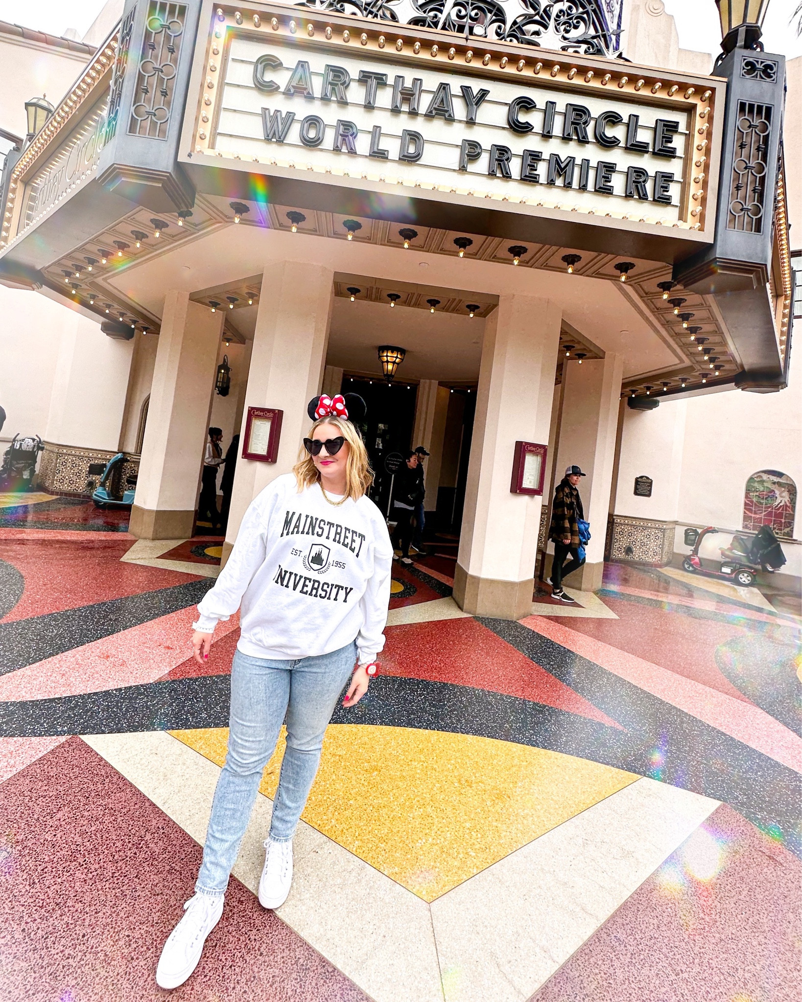 The perfect look for Disneyland! Love this Main Street University sweatshirt. Pair it with classic Minnie Ears, heart sunglasses, Disney jewelry, and platform converse high tops for the ultimate Disney look! ❤️ 

#LTKunder100 #LTKstyletip #LTKunder50