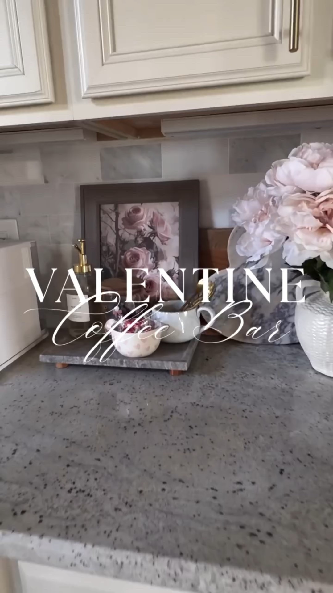 I don’t go all-out for Valentine’s Day decor…
but my coffee bar always gets a little love 💕☕️

Kept it simple with affordable Target finds—marble riser, pink bow canister (yes, it was $5 😍), heart mug for spoons, chocolate-filled bowl, gorgeous marble heart tray, and faux pink peonies to tie it all together.

Easy, cozy, and festive without overdoing it ✨
Follow along for more seasonal decor + styling tips 🤍


#coffeebarstyling
#valentinesdecor
#valentinescoffee 
#kitchendecor
#coffeestation

#LTKHome #LTKSeasonal #LTKValentine