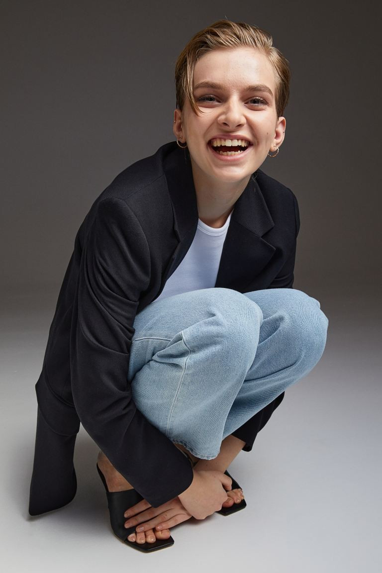 Slightly looser-fit, 5-pocket jeans in washed cotton denim with distressed details. High waist an... | H&M (US + CA)