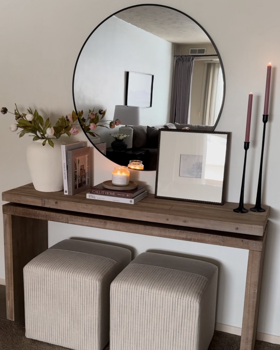 Stripe ottoman, target ottoman, peony stems, round mirror, white vase, wood console, wayfair console, arwah console, coffee table books, entryway, console table decor, spring decor, michaels spring stems, peonies 

#LTKSaleAlert #LTKHome #LTKSeasonal