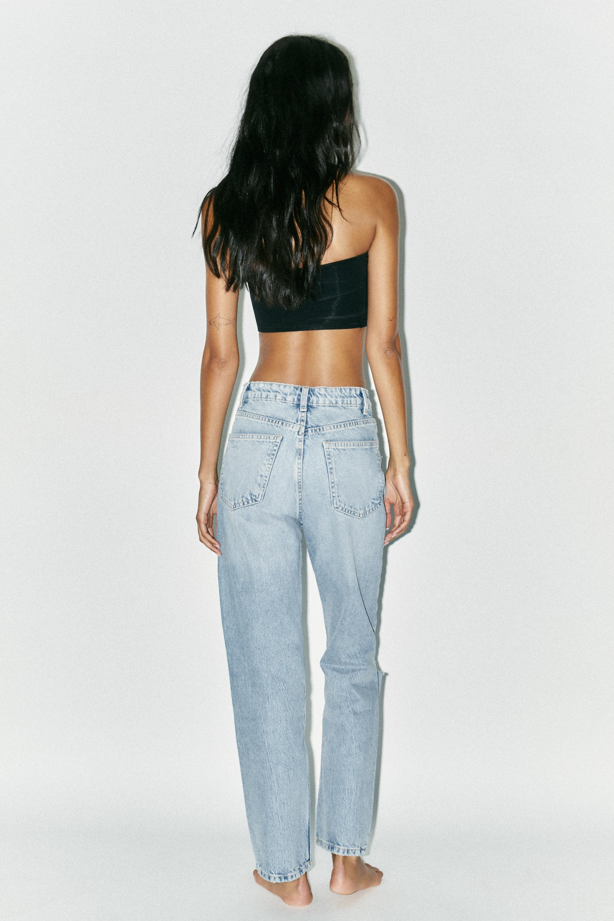 HIGH WAIST - REGULAR LENGTHHigh-waisted jeans with belt loops and five pockets. Ripped detail on ... | Zara US