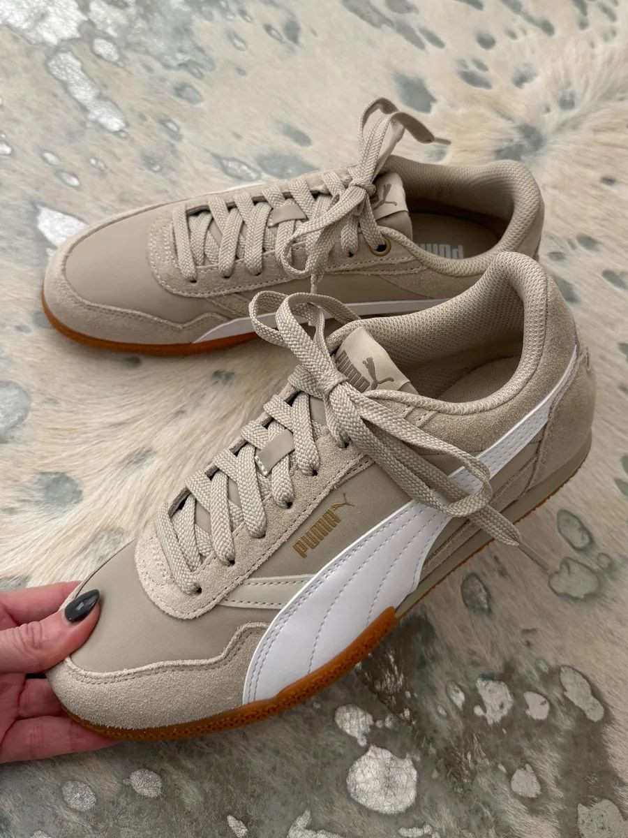 These neutral Puma sneakers are the perfect spring everyday shoe 🤍 The soft beige + white combo goes with everything (denim, dresses, shorts, even athleisure), and the classic low-profile and slim style gives that clean, polished vibe. Plus, they’re on sale right now, which makes them an easy yes for running errands, travel days, and weekend outfits. 

 

#LTKOver40 #LTKSaleAlert #LTKFindsUnder100