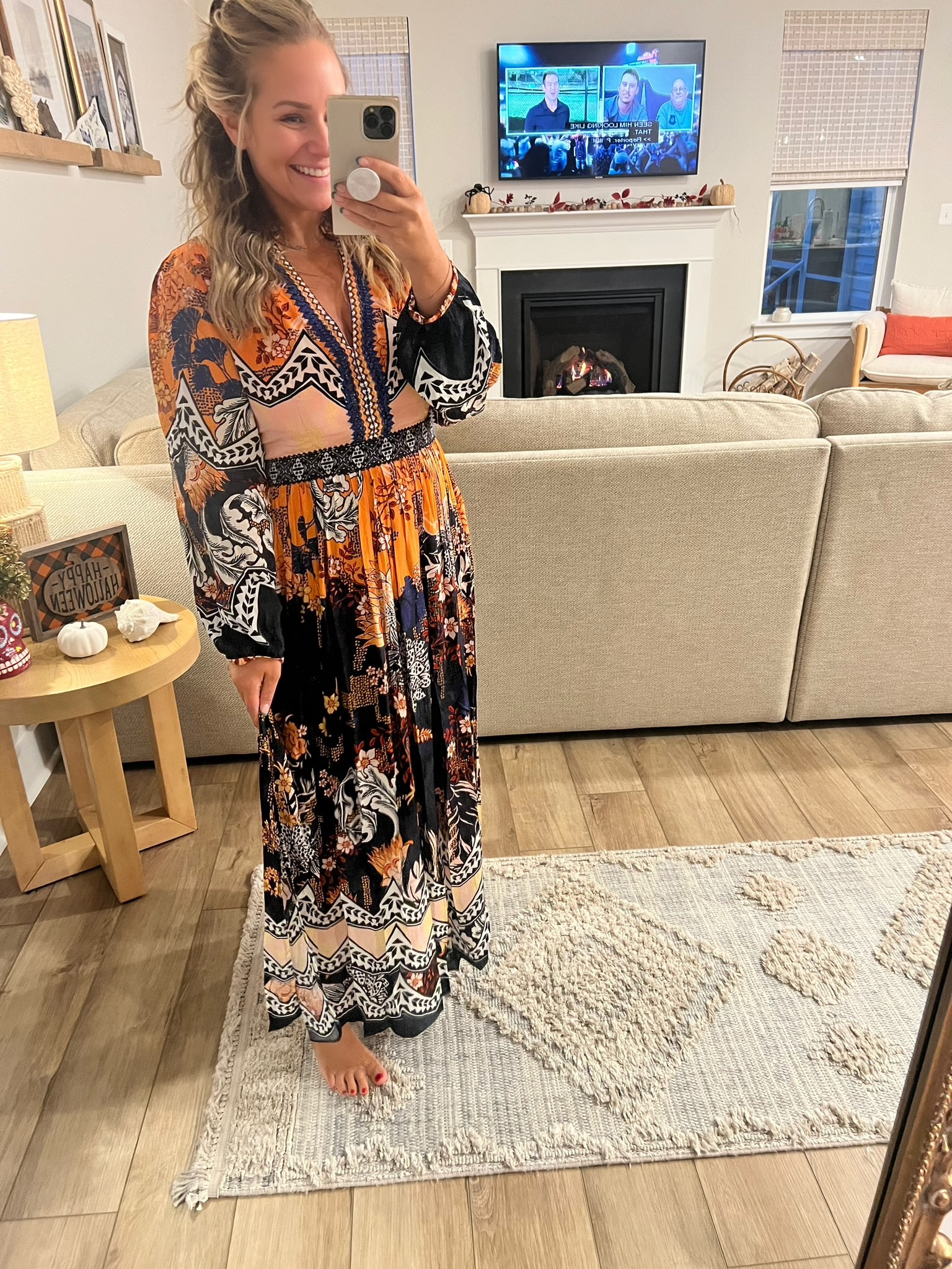 Dark orange patterned dress from Anthro! I ordered a size 10 and it was TTS!
#midsizefashion #formaldress 

#LTKCon #LTKmidsize #LTKstyletip