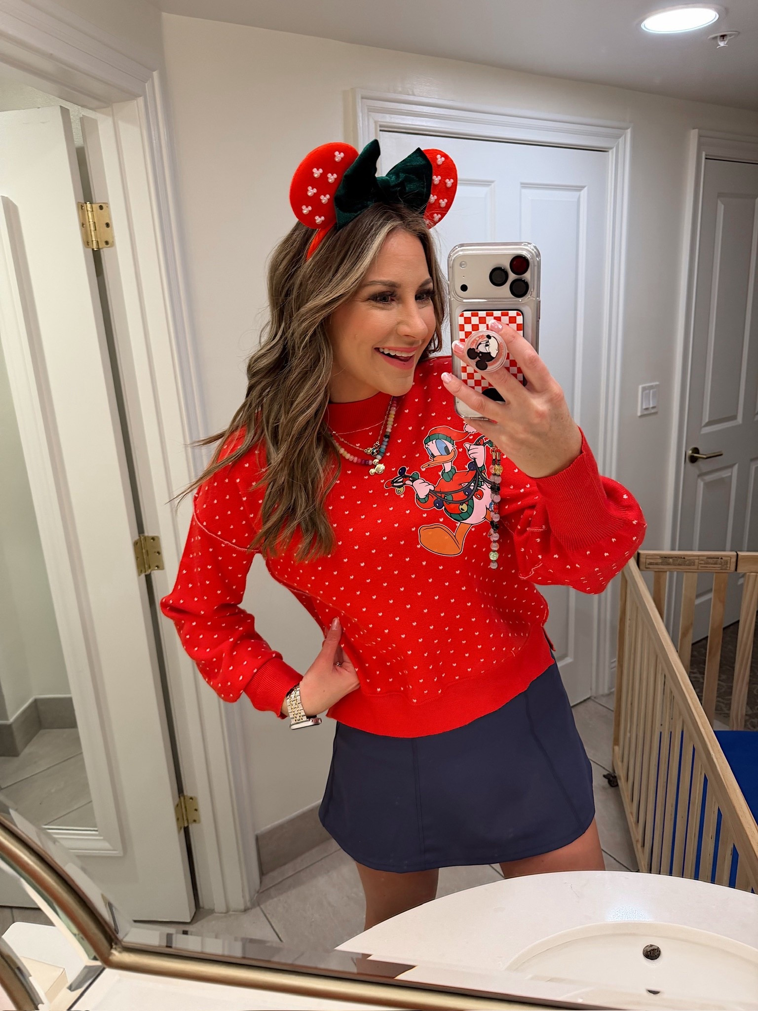 Today’s Walt Disney World ootd! In a medium tennis dress, medium sweatshirt with iron on patch, minnie ears, sneakers and accessories- fits tts. What to wear for Christmas at Walt Disney world!

#LTKootd #LTKHoliday #LTKTravel