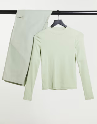 Monki Samina organic cotton ribbed long sleeve top in dusty green | ASOS (Global)
