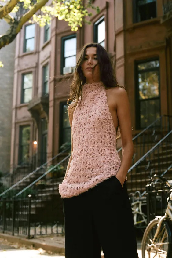 Halter neck top with an open back. Features tonal textured appliqu\u00e9. Asymmetric hem. | Zara US